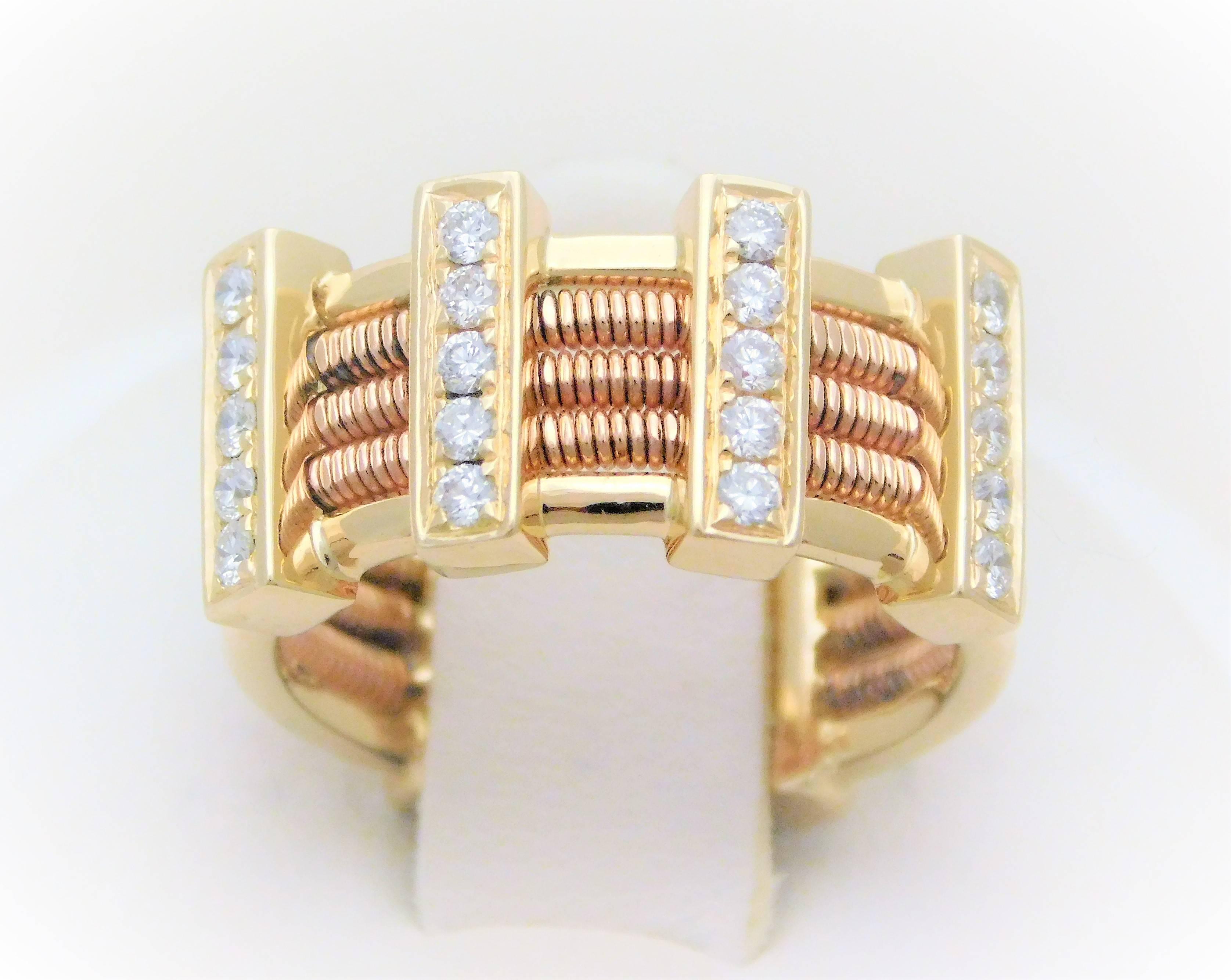 From an exquisite New Orleans estate.  Circa 2017.   This unique designer ring has been hand crafted in solid 18k yellow gold.  It has been masterfully jeweled with a total of 20 G/VVS round brilliant-cut diamonds approximating 0.60ct in total carat