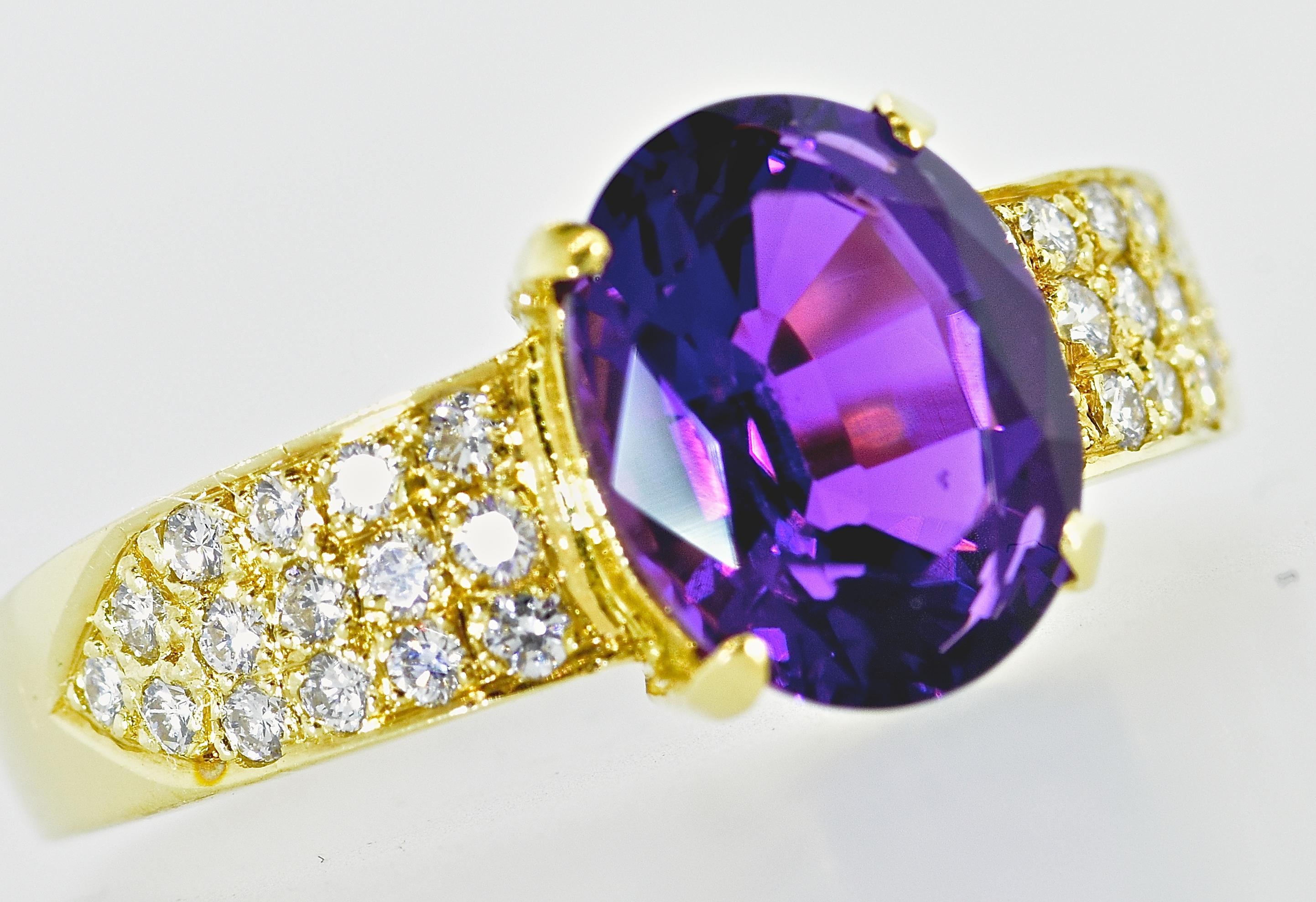 Amethyst, diamond and 18K yellow gold defines this well made ring.  The 30 diamonds are round brilliant cut, well matched, and near colorless (H), and very slightly included (VS1).  They are estimated to weigh a total of .25 cts.  The oval natural