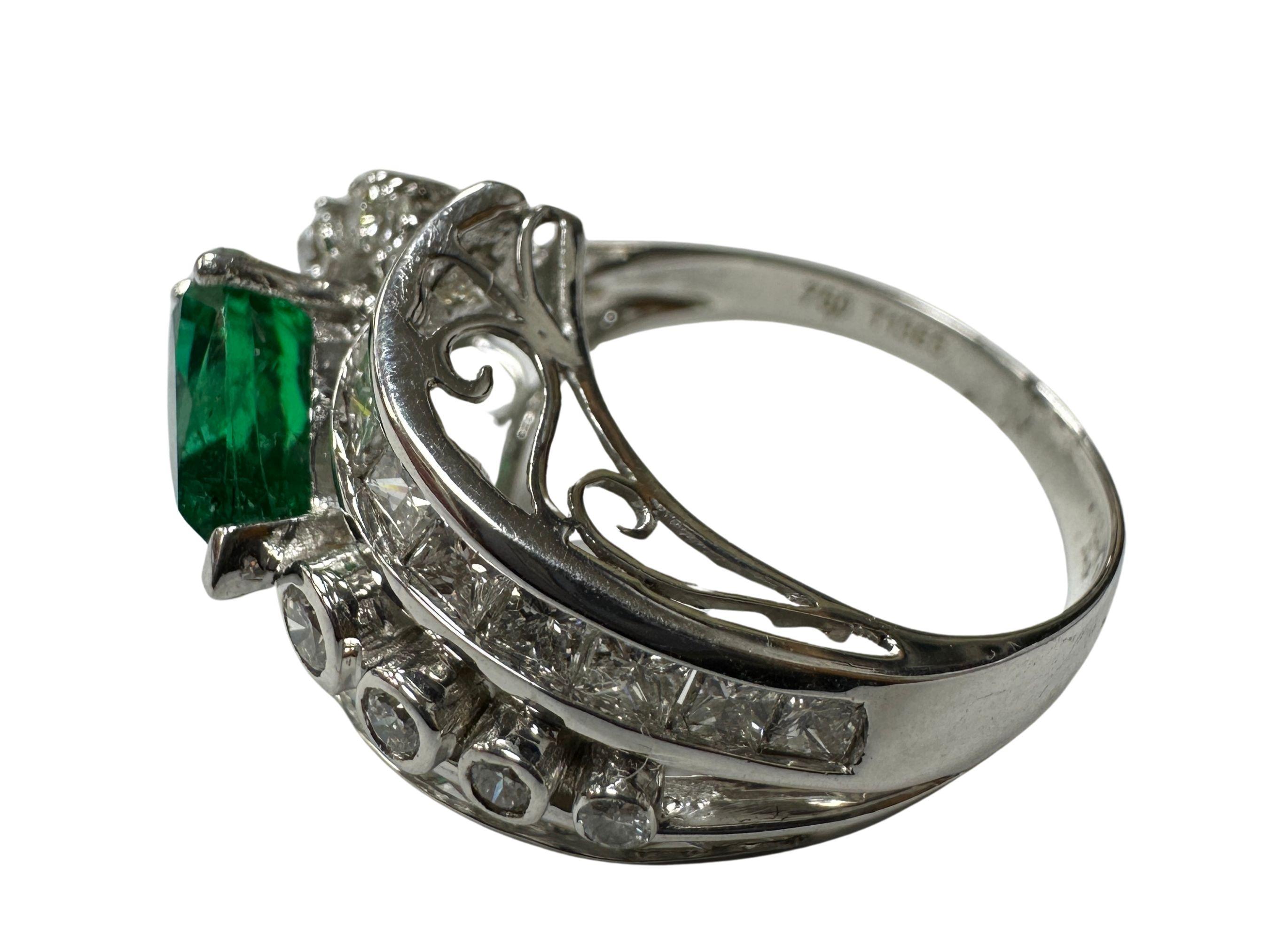 Women's 18k Diamond and Pear Shaped Emerald Ring For Sale