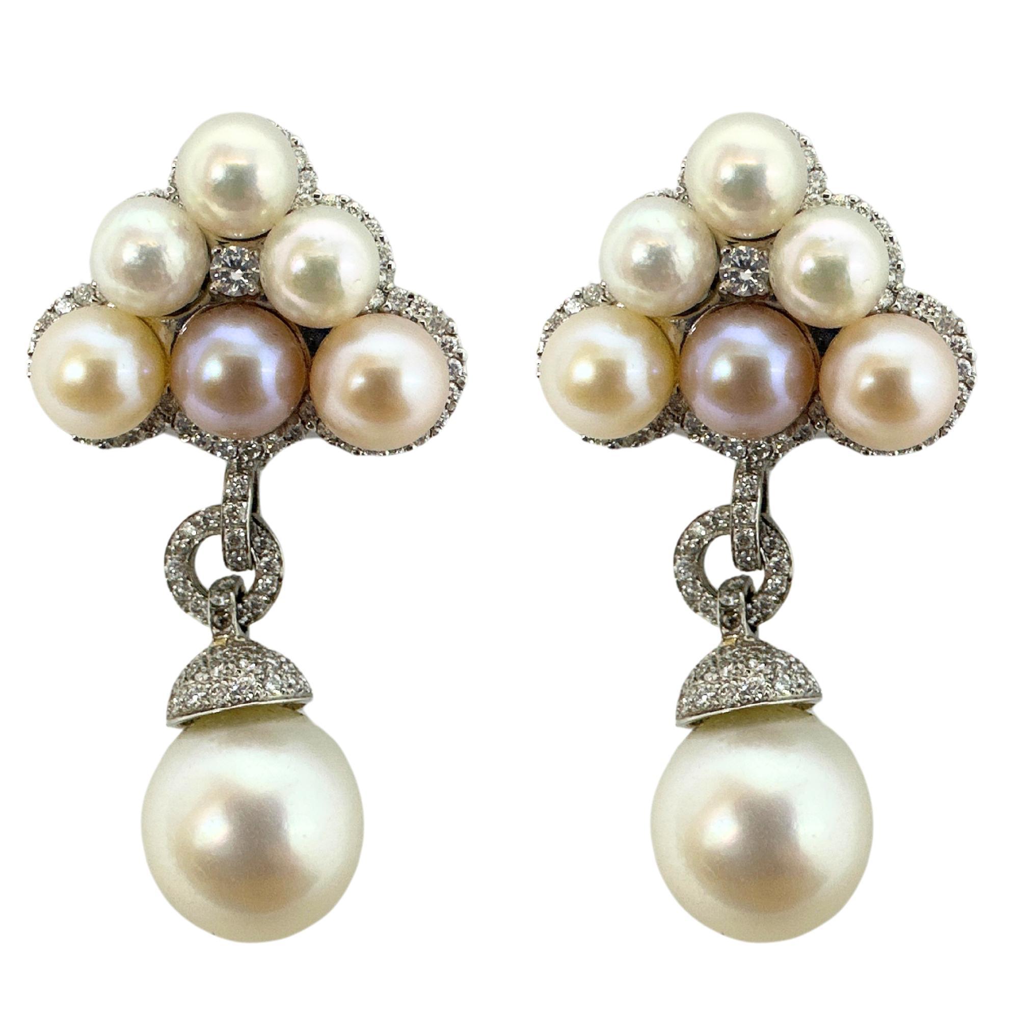 18K Diamond and Pearl Earrings
Condition: In good condition with some minor surface wear consistent with age.
Length: 1.75 inches long, 0.80 inches wide
Markings: 