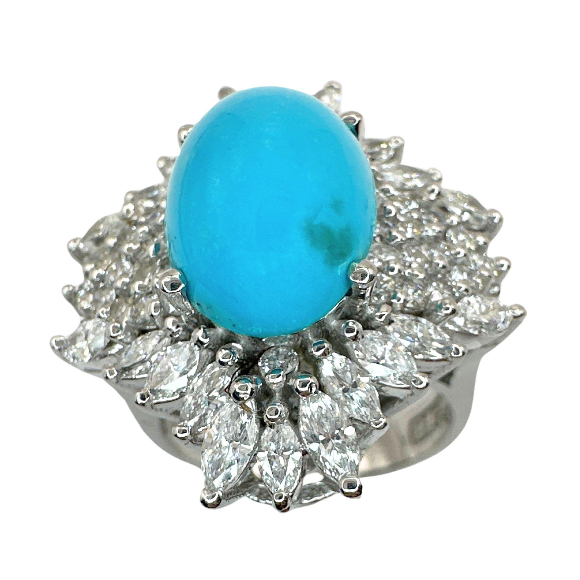 Exude elegance with this stunning 18k diamond and turquoise ring. Crafted in 18k white gold, it features a total of 1.76 carats of diamonds and a 6.40 carat turquoise center. In good condition with minor surface wear suitable for its age, this ring