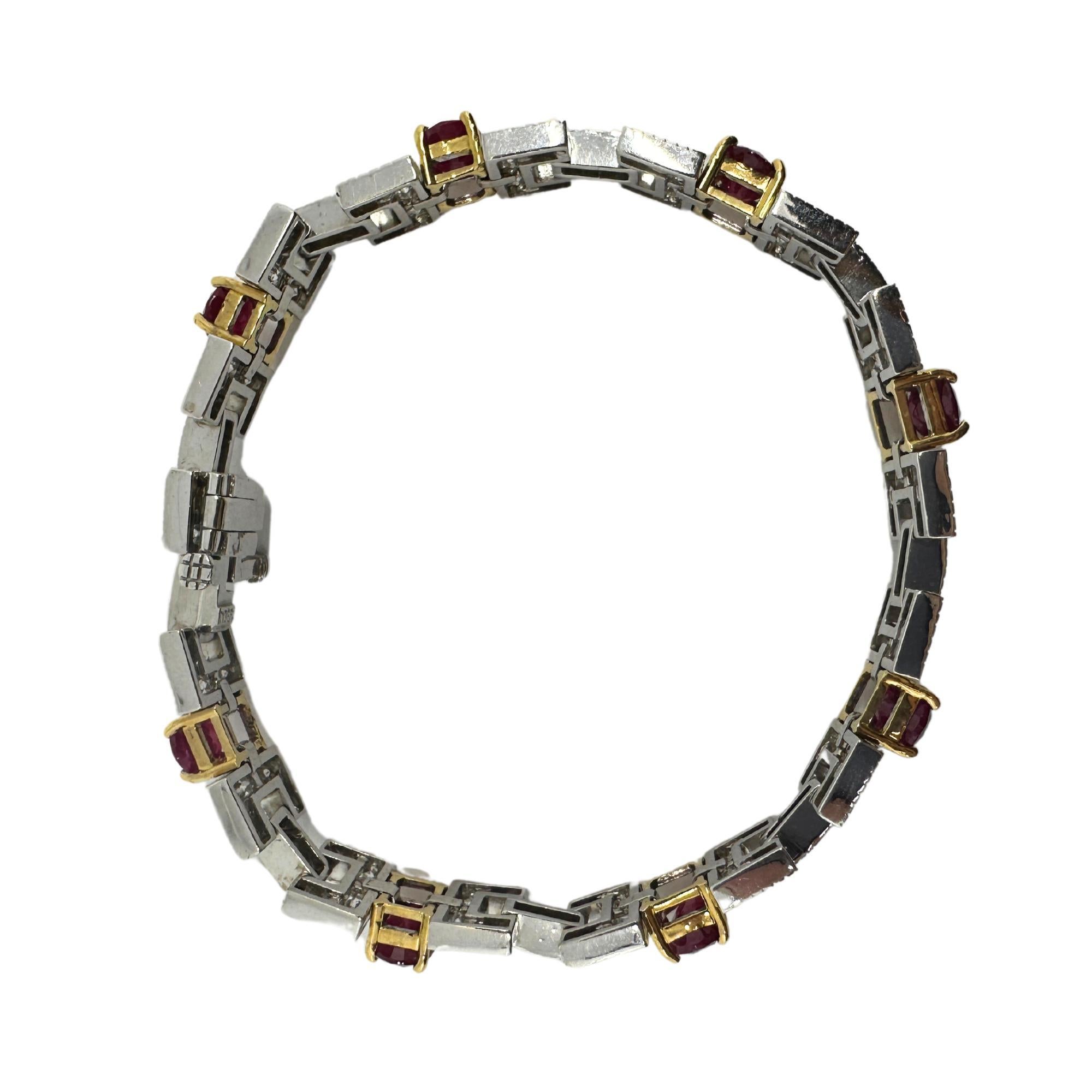 Regardez ce superbe bracelet en diamant et rubis 18k ! 

Bracelet en diamant et rubis 18K
Condit : En bon état avec quelques légères usures de surface dues à l'âge.
Longueur : 7,5 pouces
Marques : 