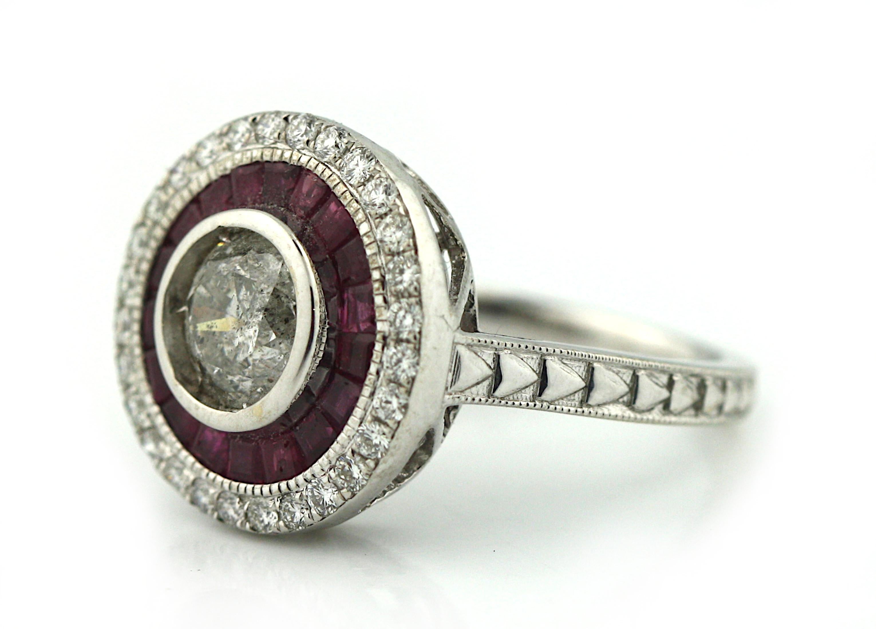18K Diamond and Ruby Ring 
Featuring a round, brilliant-cut diamond center stone, weighing approximately 1.19 carats, within a surround of eighteen square step-cut rubies and completed with twenty-eight round brilliant-cut diamonds. 
Total weight