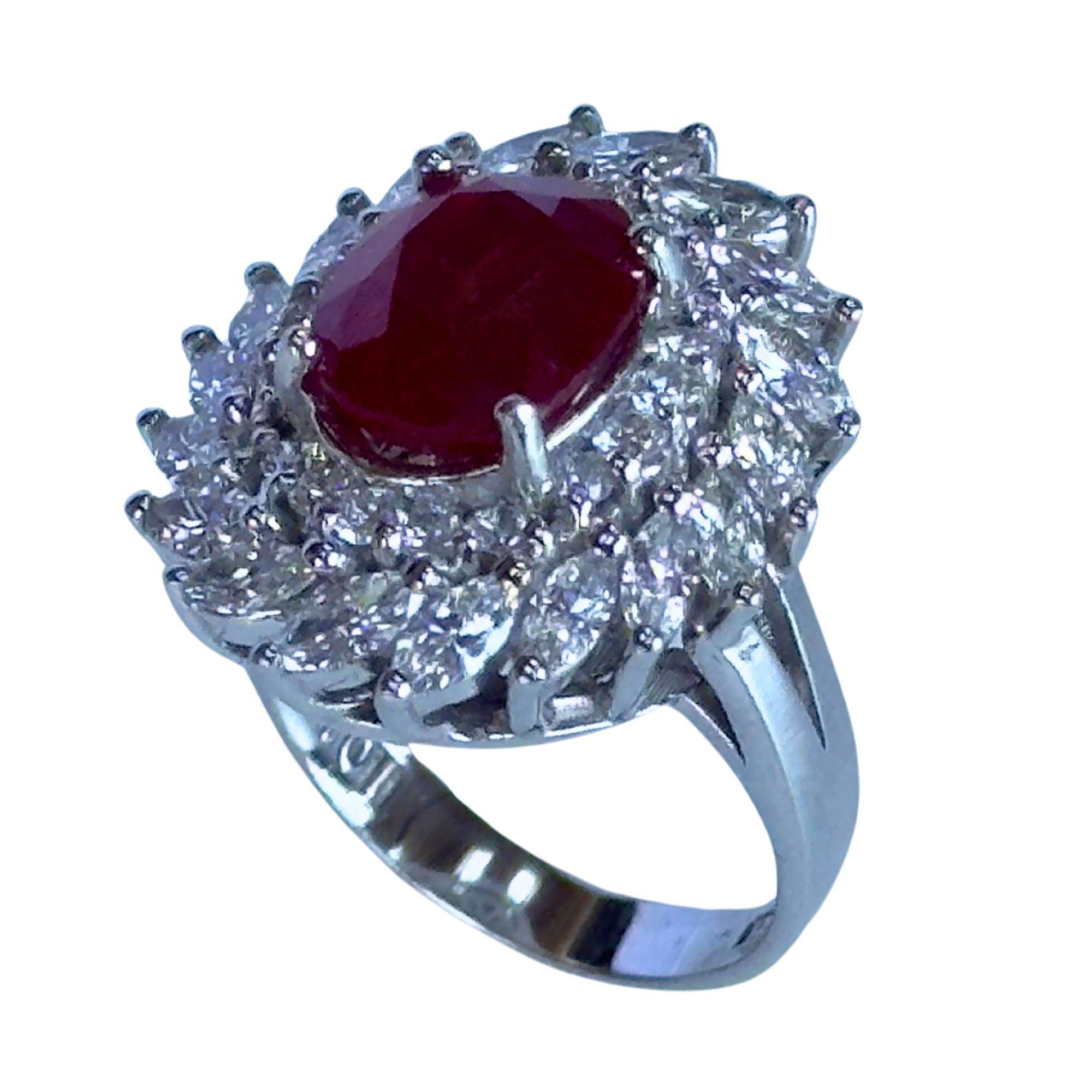 Indulge in luxury and sophistication with this 18k Diamond and Ruby Ring. Crafted with 18k white gold and marked with 