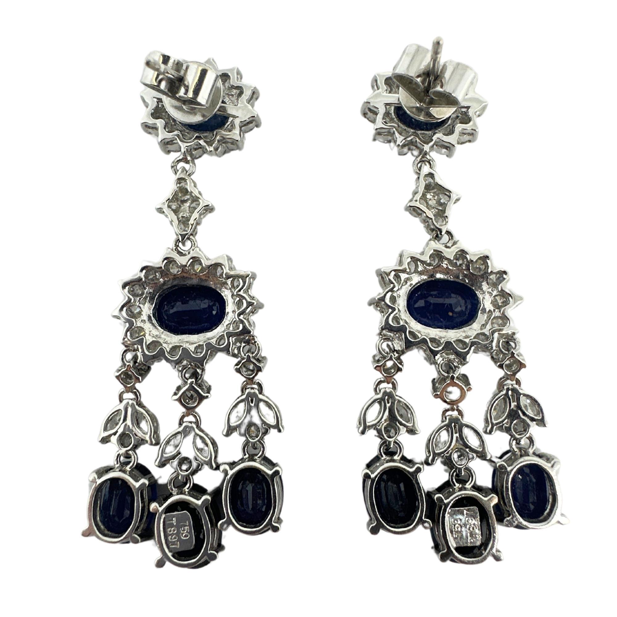 18K Diamond and Sapphire Earrings
Condition: In good condition with some minor surface wear consistent with age.
Length: 1.75 inches
Markings: 