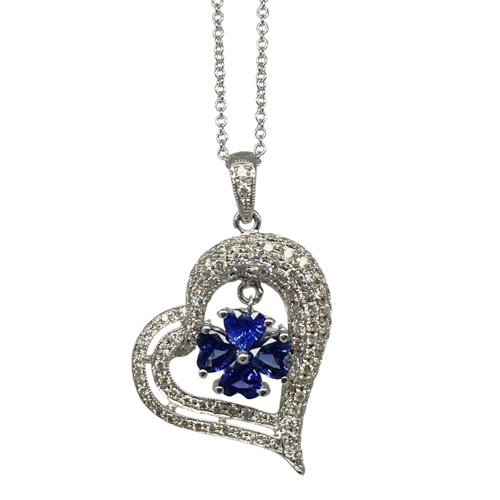 Add a touch of elegance to your look with our 18k Diamond and Sapphire Heart Pendant Necklace. The stunning combination of 1.23 carats of diamonds and 2.10 carats of sapphires will sparkle on your neck. The 18 inch chain can also be shortened to