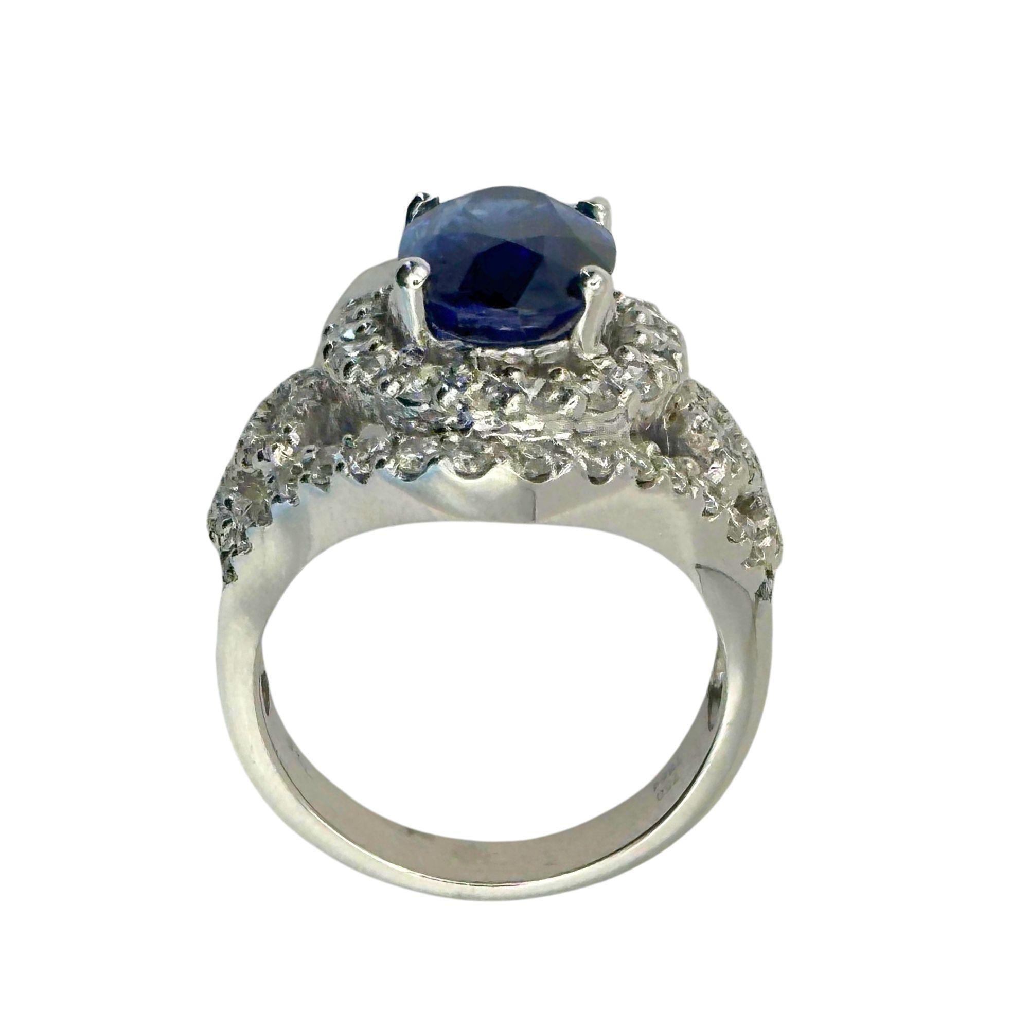 Oval Cut 18k Diamond and Sapphire Ring For Sale