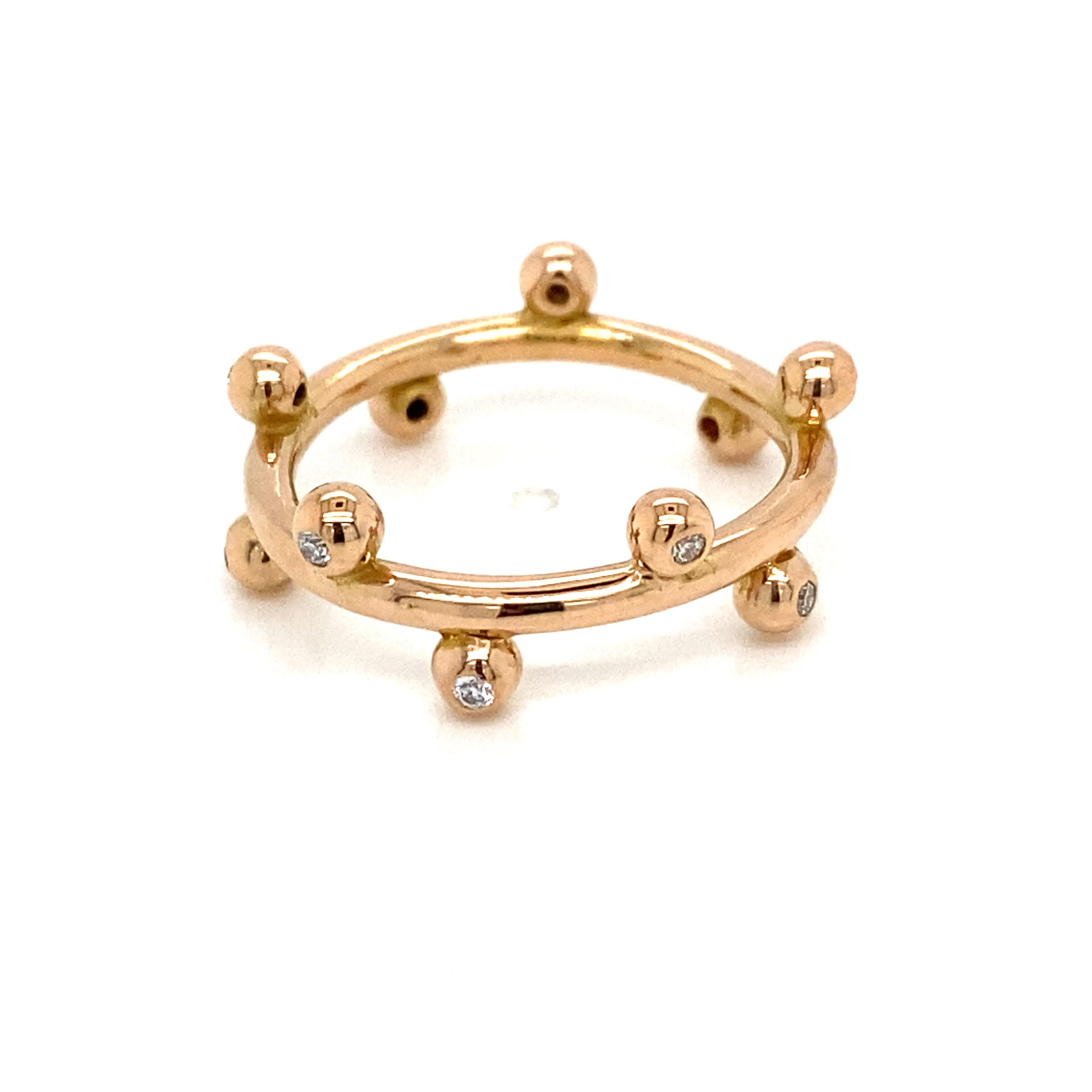 Diamond Bezel Stackable Band Ring in 18K Rose Gold.  Round Brilliant Cut Diamonds weighing 0.15 carat total weight, G-H in color and VS in clarity are expertly set. The Ring measures 1/4 inch in width at the widest point.  Ring size 6 3/4. 4.66