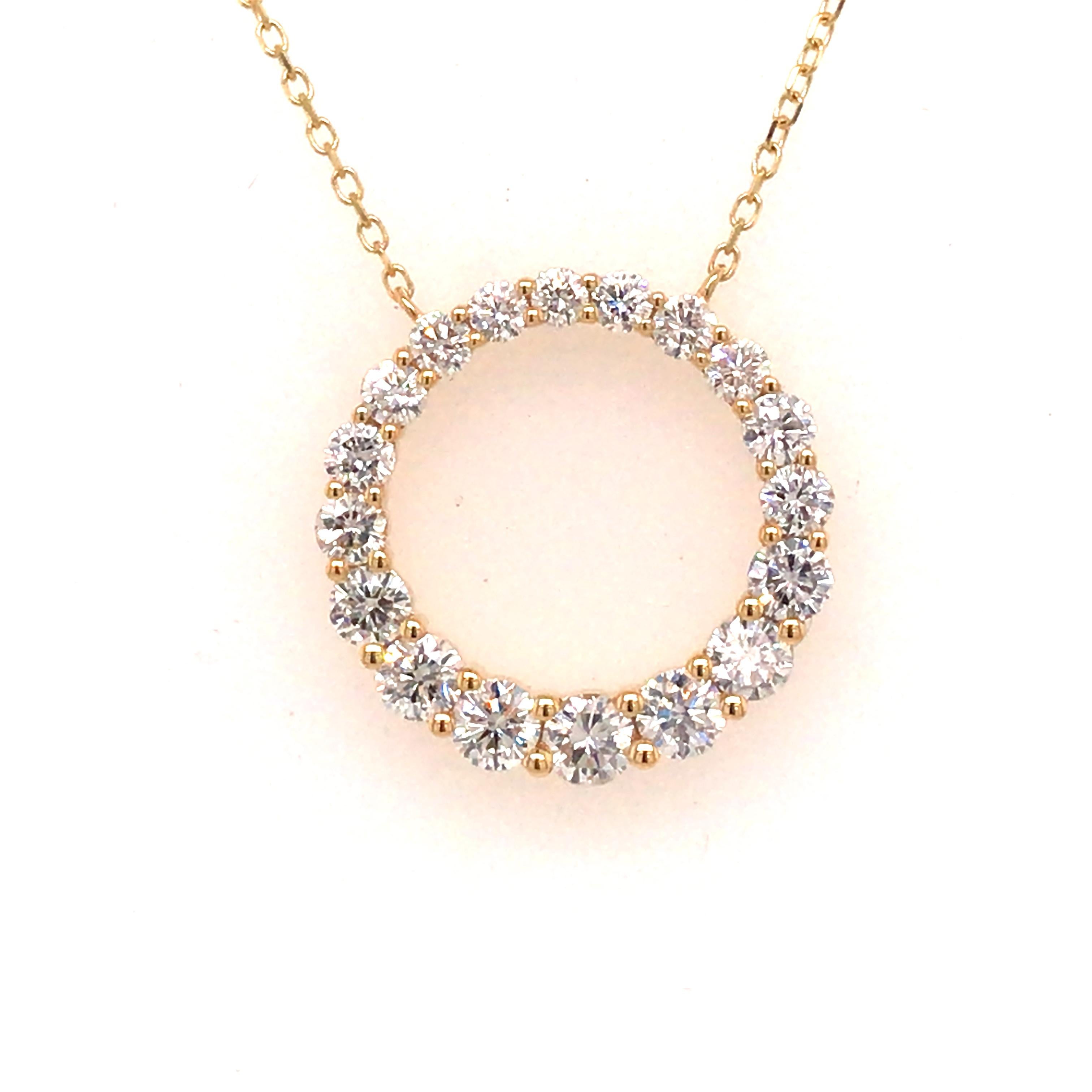 Diamond Circle Pendant in 18K Yellow Gold. (18) Round Brilliant Cut Diamonds weighing 0.88 carat total weight G-H in color and VS in clarity are expertly set. The Necklace measures 16 inch length. The Circle measures 5/8 inch in diameter. 2.95 grams.