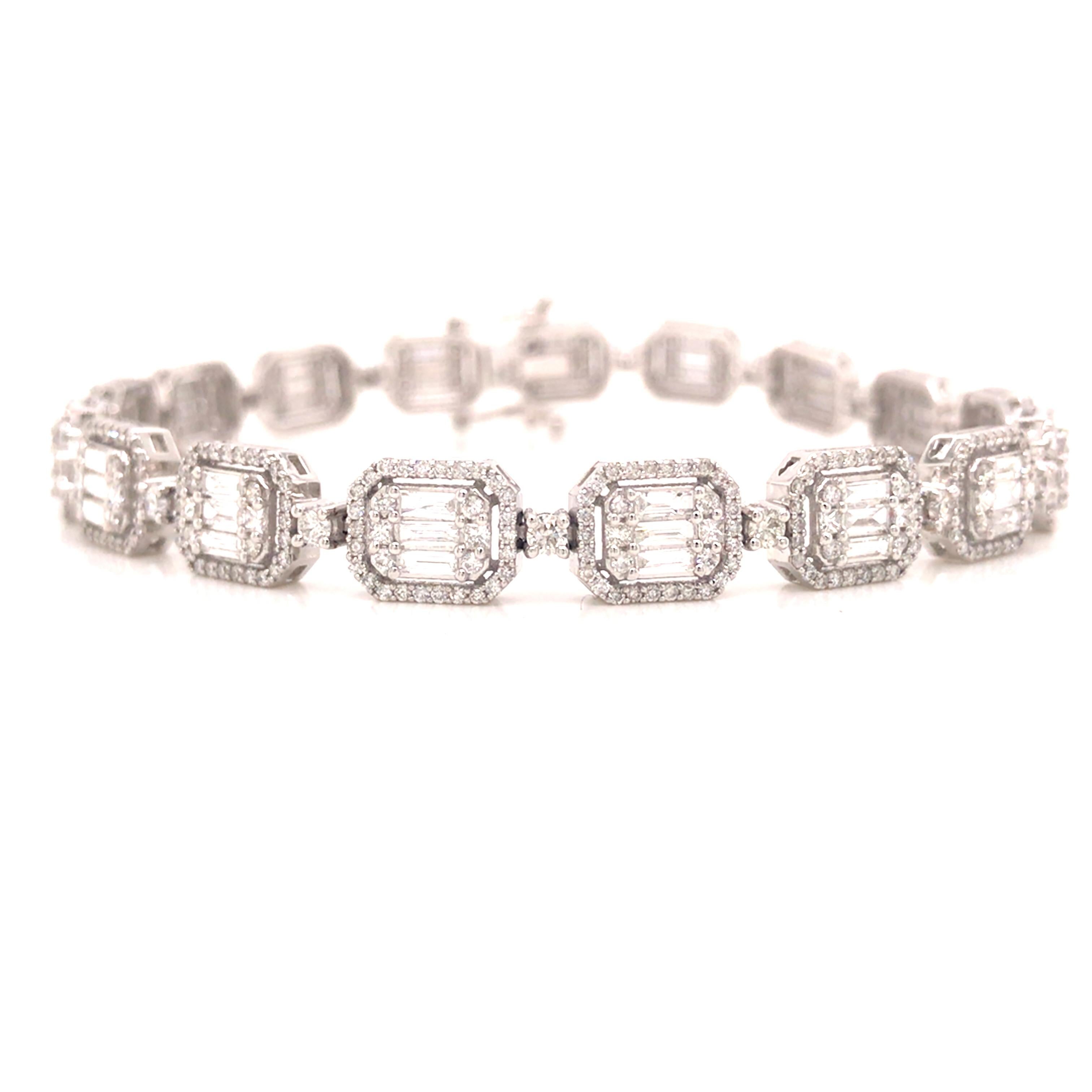 Diamond Cluster Tennis Bracelet in 18K White Gold.  Round Brilliant Cut, Princess Cut and Baguette Diamonds weighing 4.44 carat total weight, G-H in color and VS-SI in clarity are expertly set.  The Bracelet measures 7 1/4 inch in length and 1/4