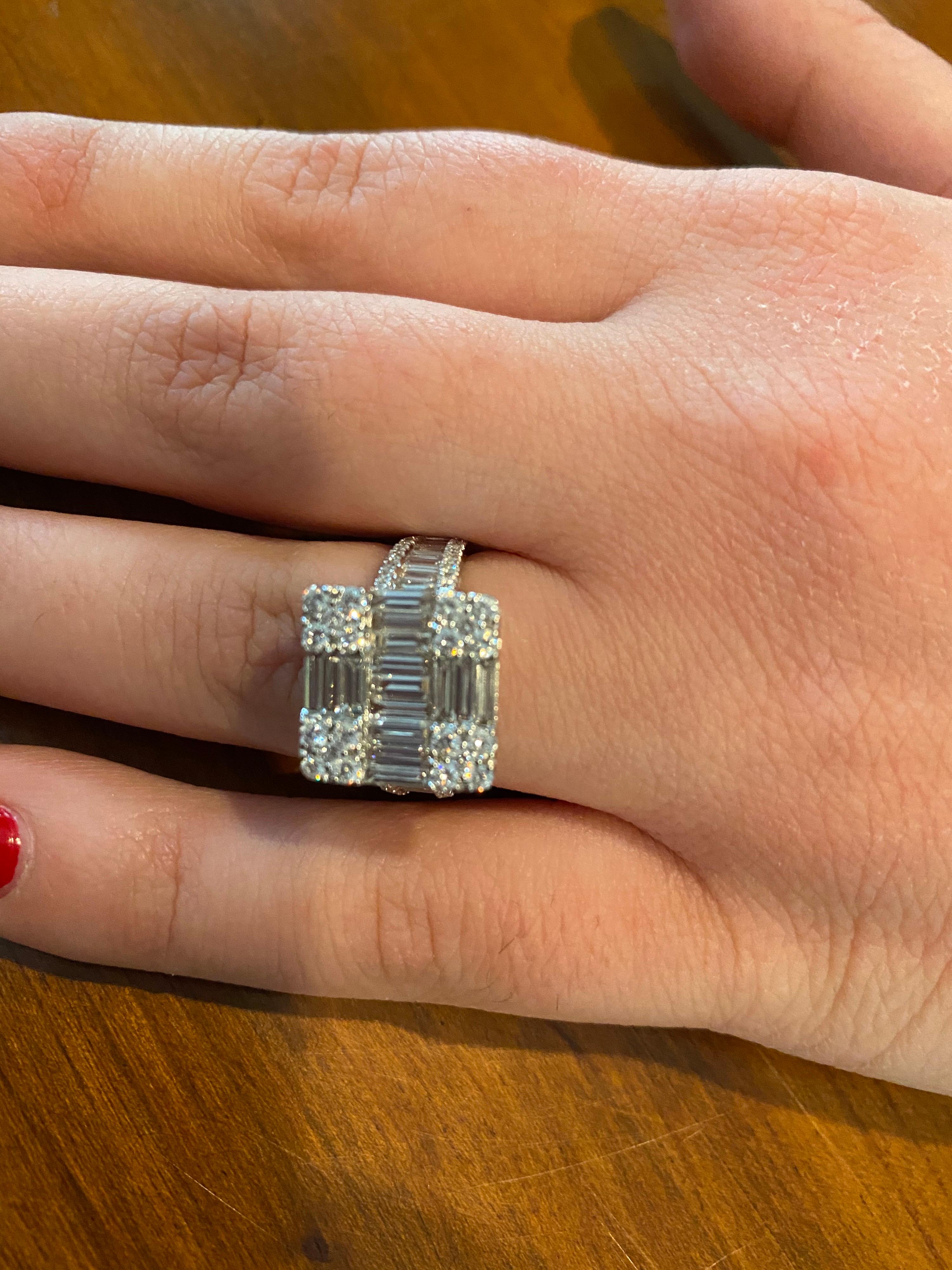 Diamond cocktail ring set with baguette and round diamonds in 18K white gold. The total carat weight is 2.53. The color of the stones are F, the clarity is VS1-VS2. The ring is a size 6.5.