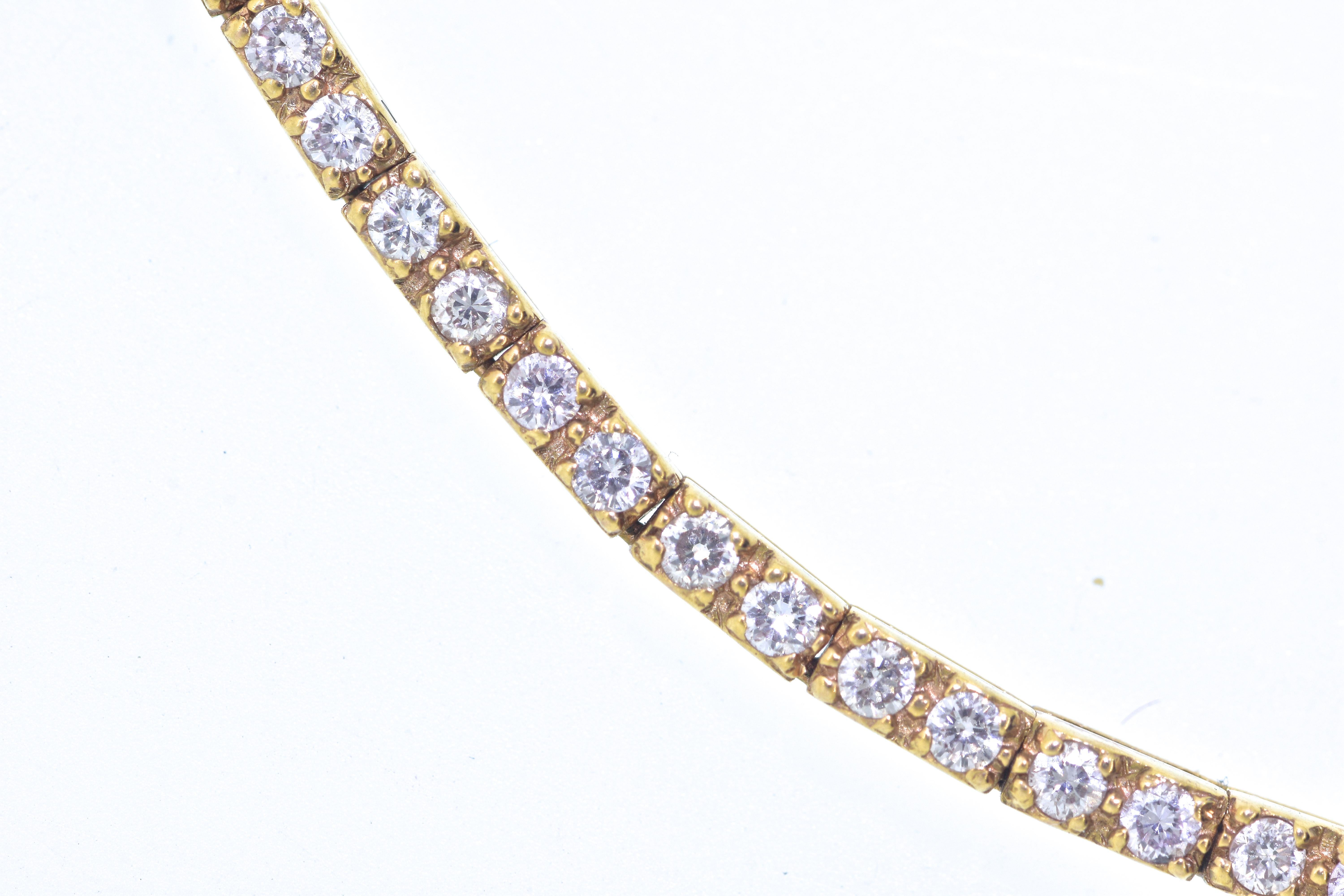 Diamond necklace in 18K rose gold.  This necklace is perfect for the neckline during both the day and into evening.  There are 192 round brilliant cut diamonds all well matched, well cut and estimated to weigh 2.88 cts.  This necklace is well made