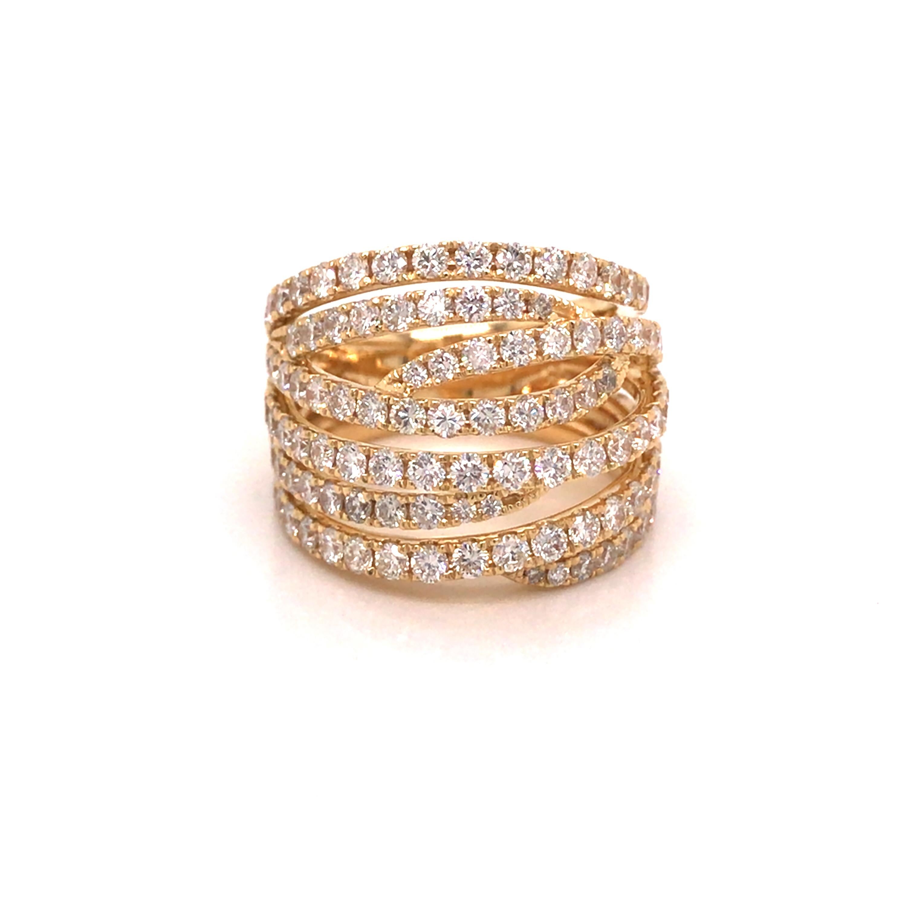 Diamond Crossover Band in 18K Yellow Gold.  Round Brilliant Cut Diamonds weighing 3.05 carat total weight, G-H in color and VS-SI in clarity are expertly set.  The Band measures 5/8 inch in width.  Ring size 6. 9.33 grams.
