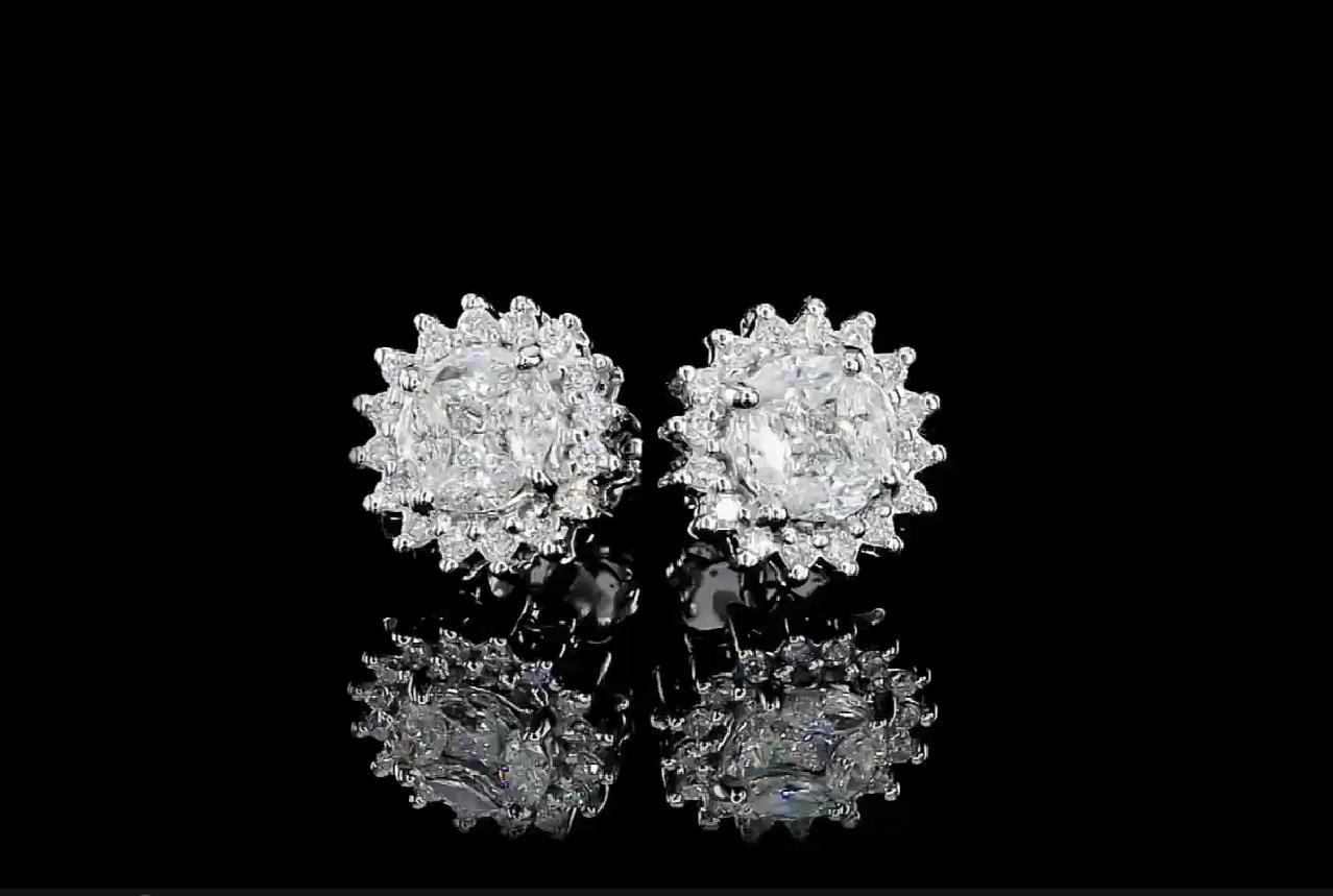 18kt white gold ring with diamonds
  
  Gold colour & karat: White gold 18kt
  Weight: 4.39 grams
  
  Set with-
  Stone type: Diamonds
  Shape: Round
  Carat: 0.34 (32 Pcs )
  Colour: F
  Clarity: -
  
  Surrounding Stones: Diamonds
 1) Side
