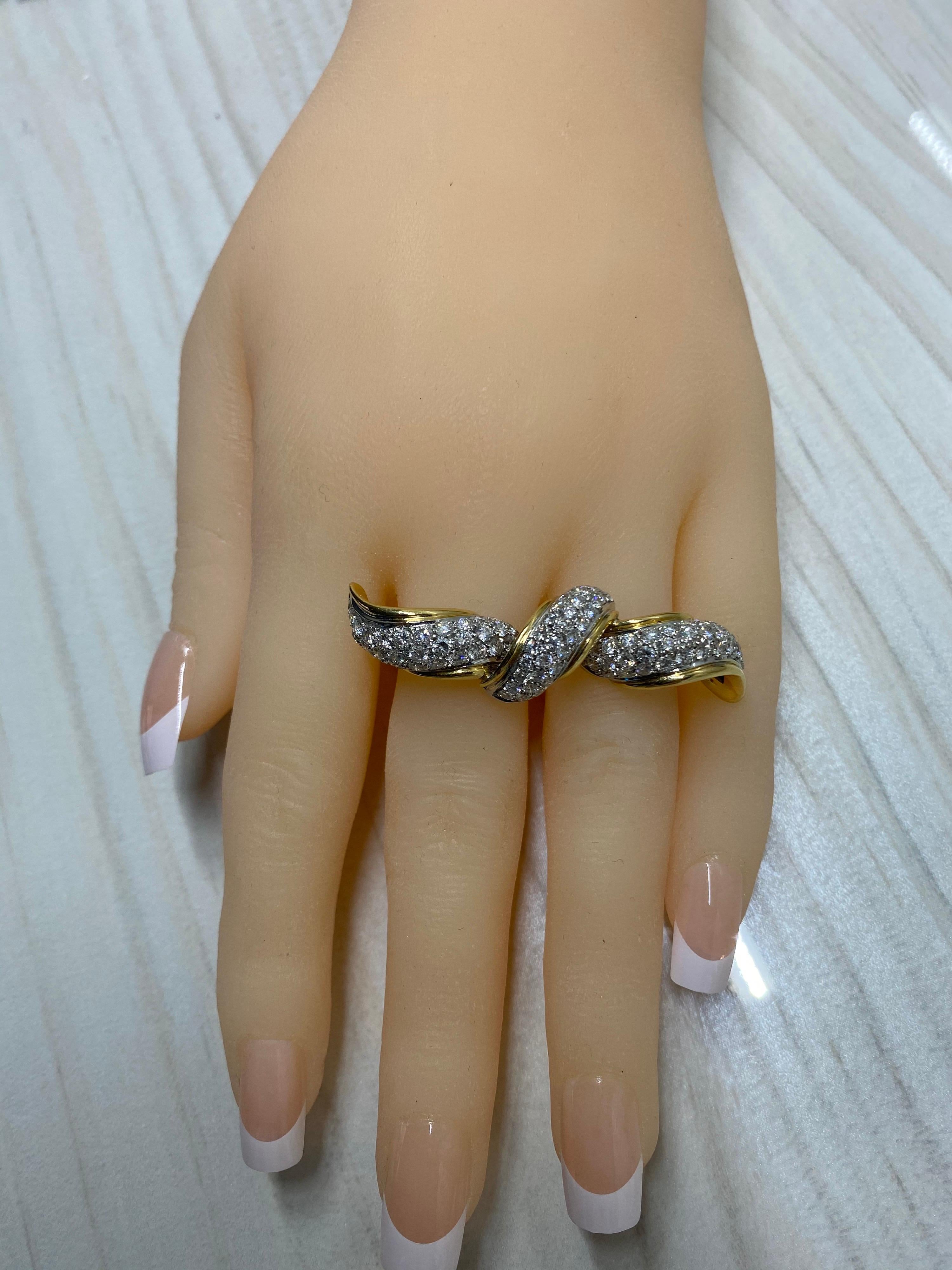 18 Karat Diamond Encrusted Two Finger Bow Ring In Excellent Condition In New York, NY