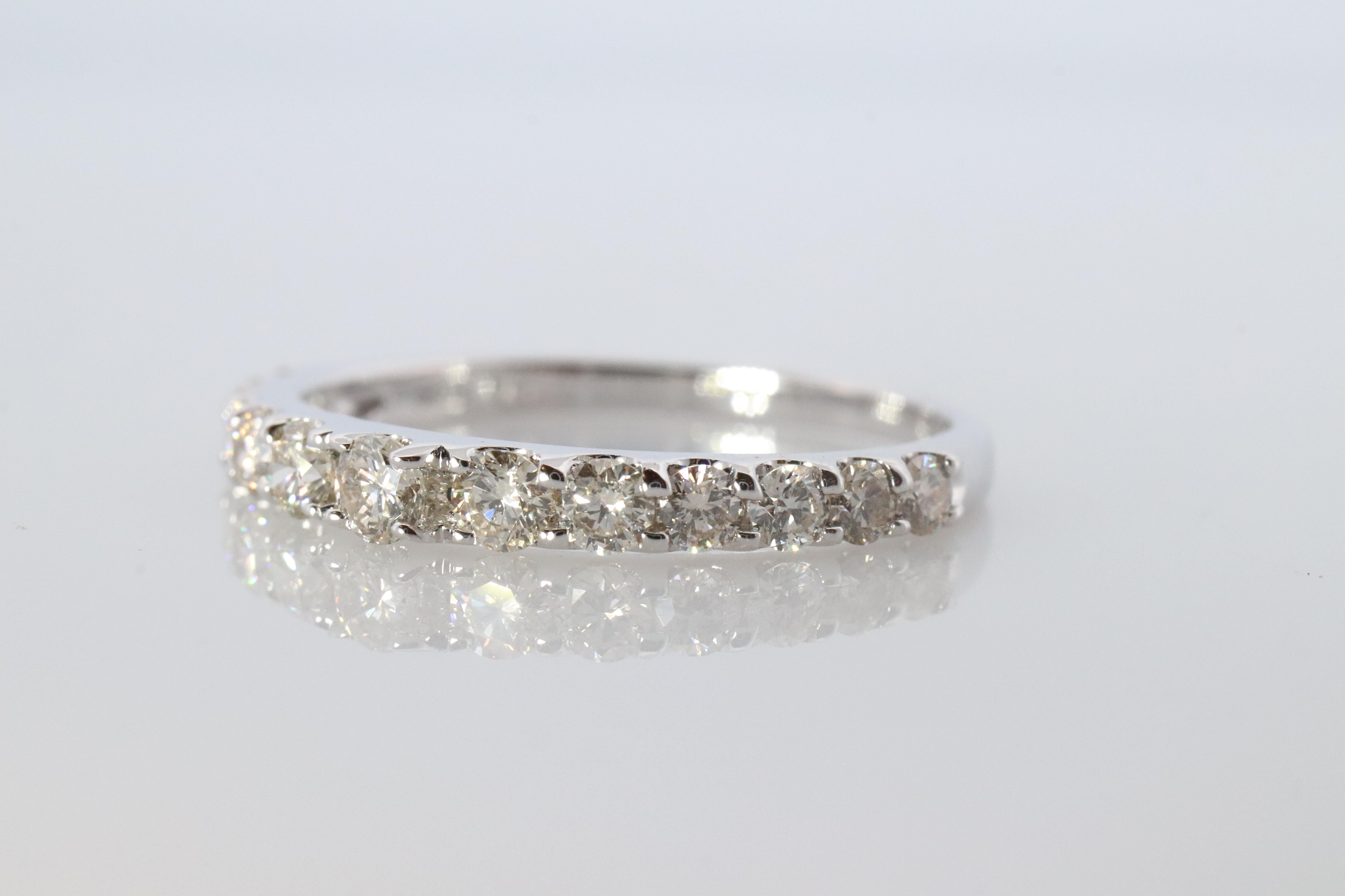 Round Cut 18k Diamond eternity band. 18k White Gold 0.5ctw half anniversary Ring. For Sale