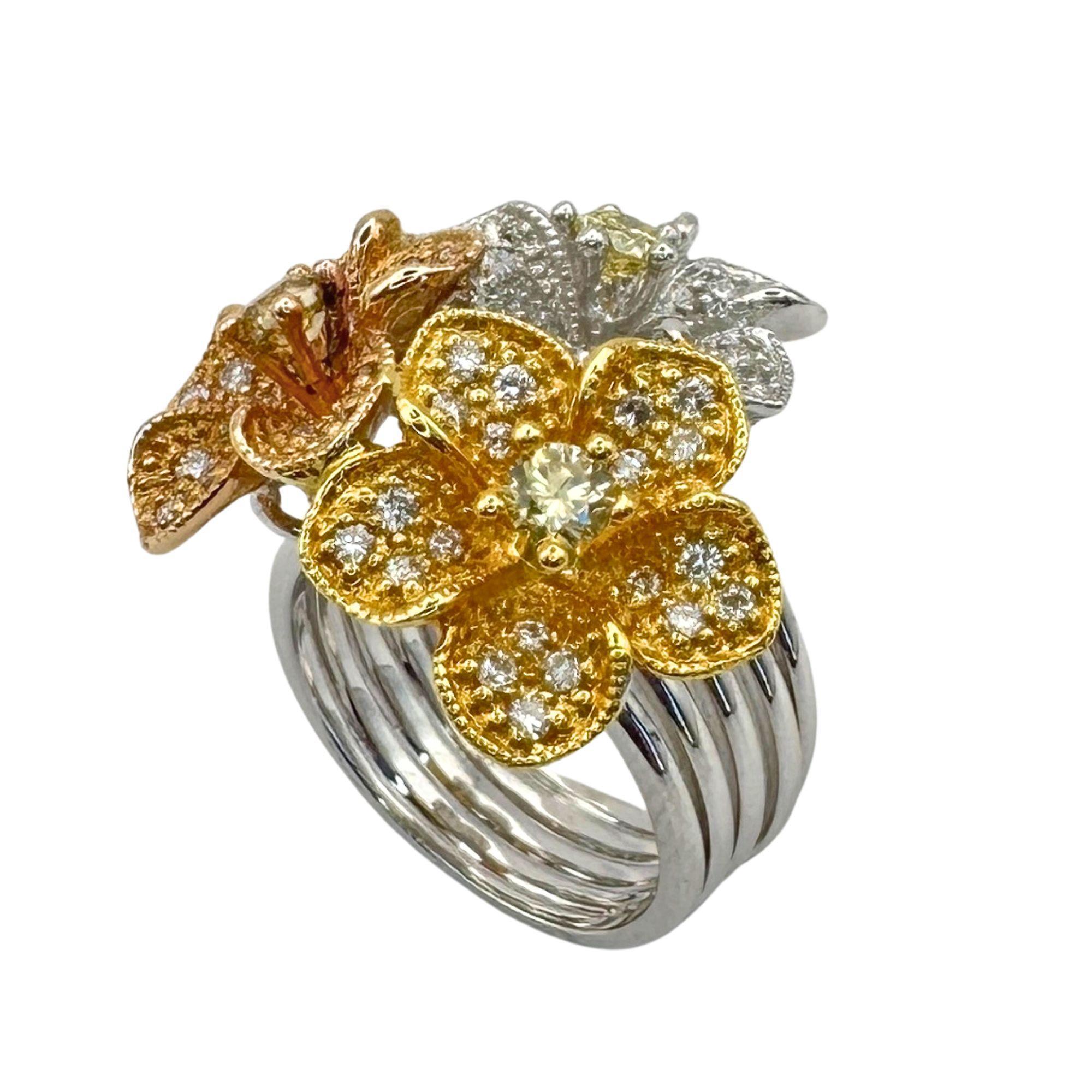 Add some glamour with our Multi-Toned 18k Diamond Floral Ring! With sparkling 1.31 carat diamonds and a weight of 15.7 grams, this ring is sure to make a unique and dazzling statement. Size 6.5, markings 