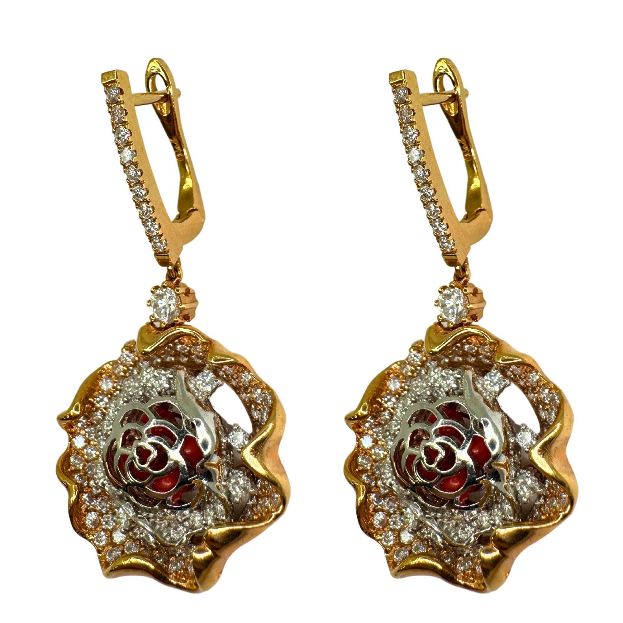 A stunning pair of 18k Diamond Flower Earrings. Crafted in 18k White and Yellow Gold, these earrings are in great condition with only minor surface wear. Measuring 1.50 inches in length and weighing 12.20 grams, these earrings feature 2.21 carats of