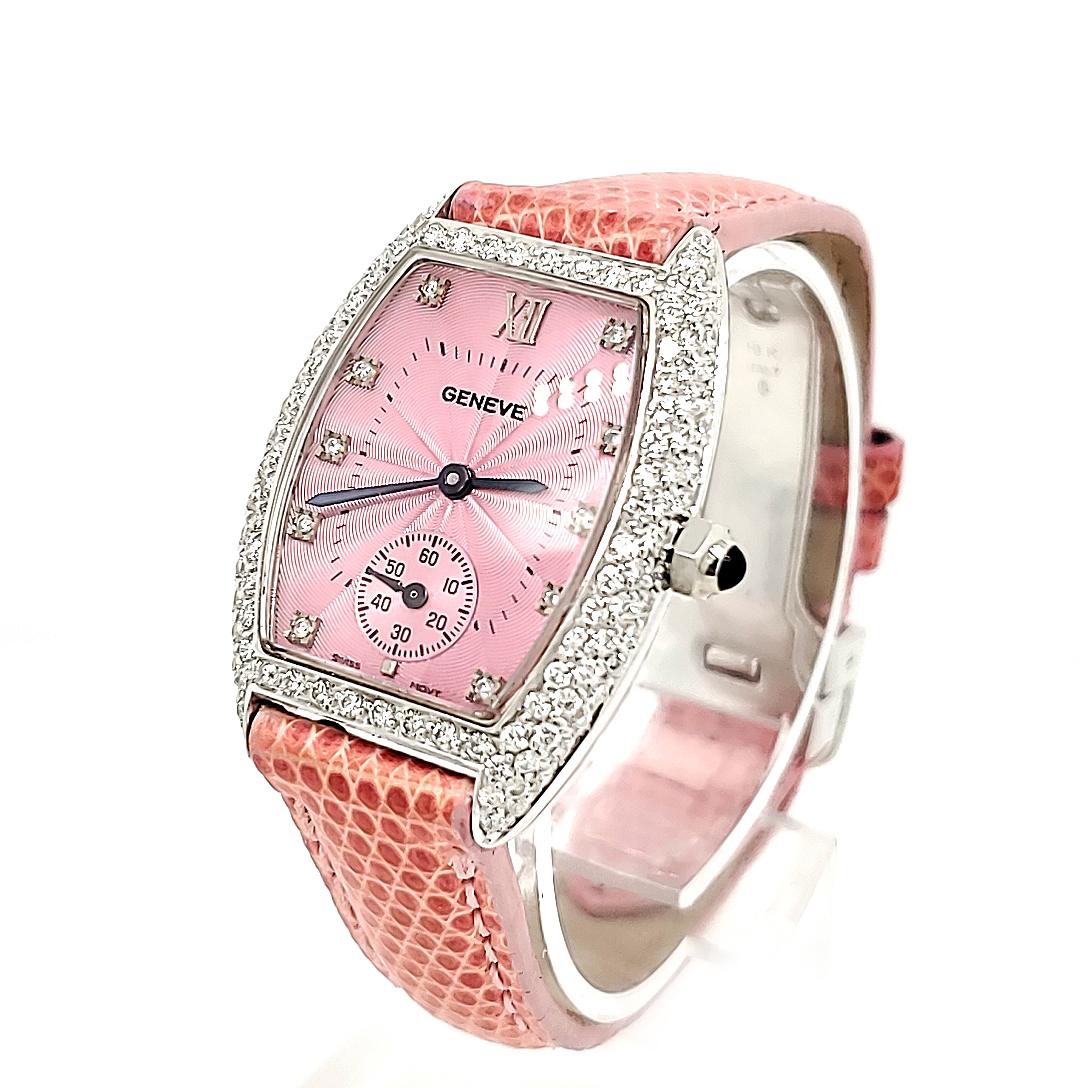 A pink Geneve Watch 2.25 carat total weigh of Round Brilliant Cut diamonds are set in the 18k WG Bezel and numbers. Pink face 26mm and pink leather Band.

Contains: RBC Dia. 2.25ctw
Dial: 23mm x 19mm
Case: 25mm (29mm w/ crown) x 36mm
Lug Width: