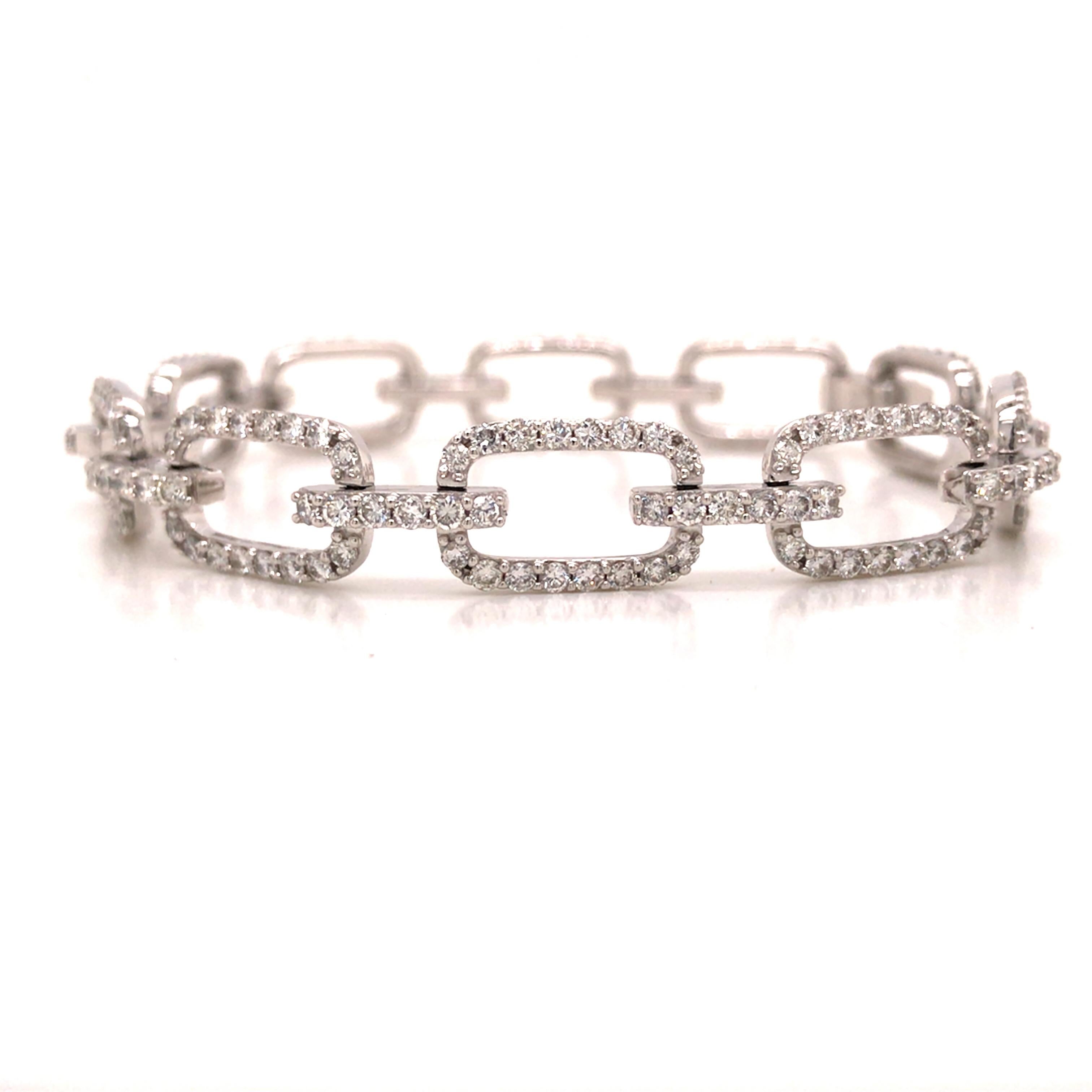 Diamond Link Bracelet in 18K White Gold.  Round Brilliant Cut Diamonds weighing 4.26 carat total weight, G-H in color and VS-SI in clarity are expertly set.  The Bracelet measures 7 inch in length and 3/8 inch in width. 20.6 grams.