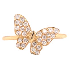 Anello a farfalla con pavé di diamanti in oro giallo 18 carati