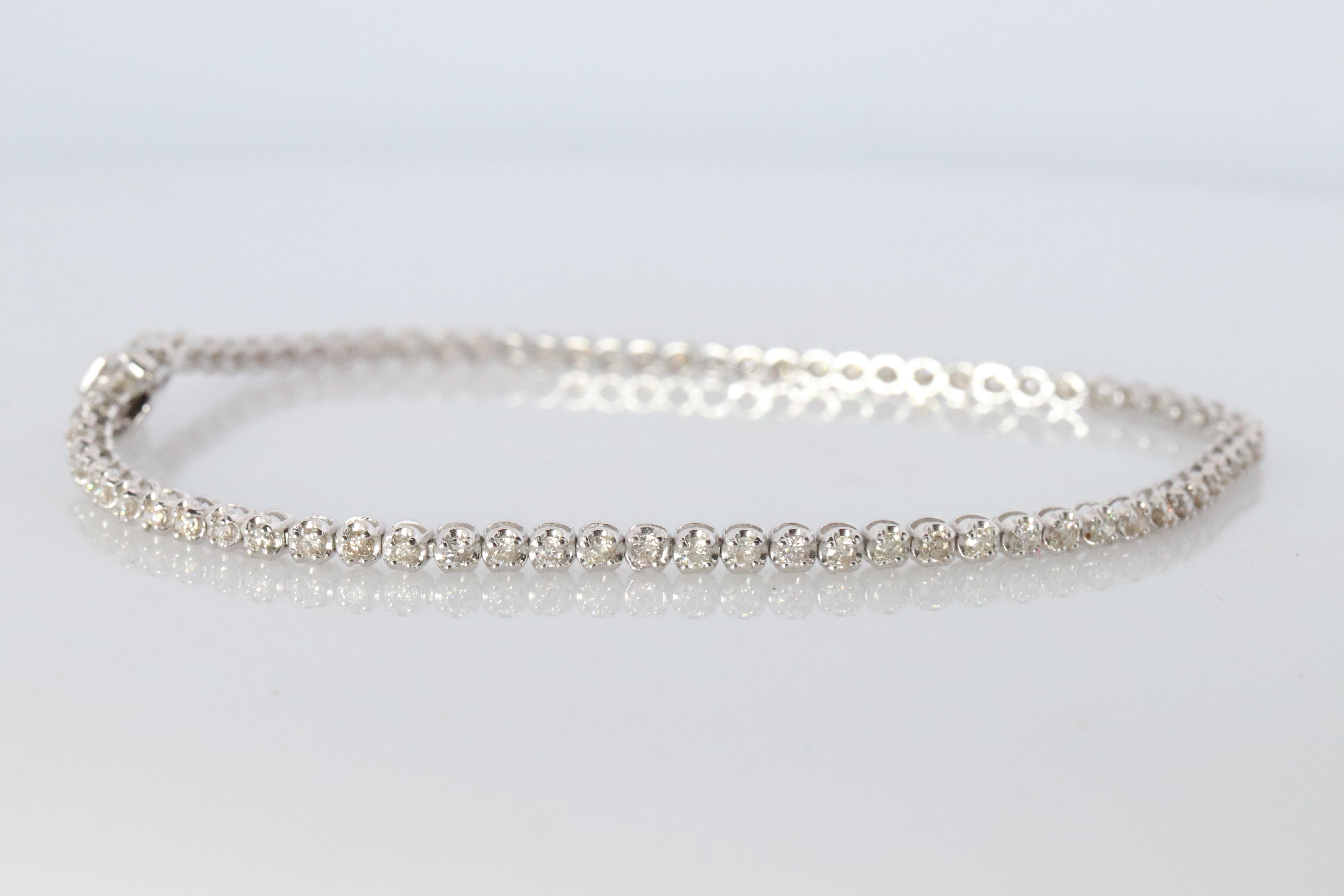 Modern 18k Diamond Tennis Bracelet. 18k White Gold round diamond Tennis bracelet. 1CTW For Sale