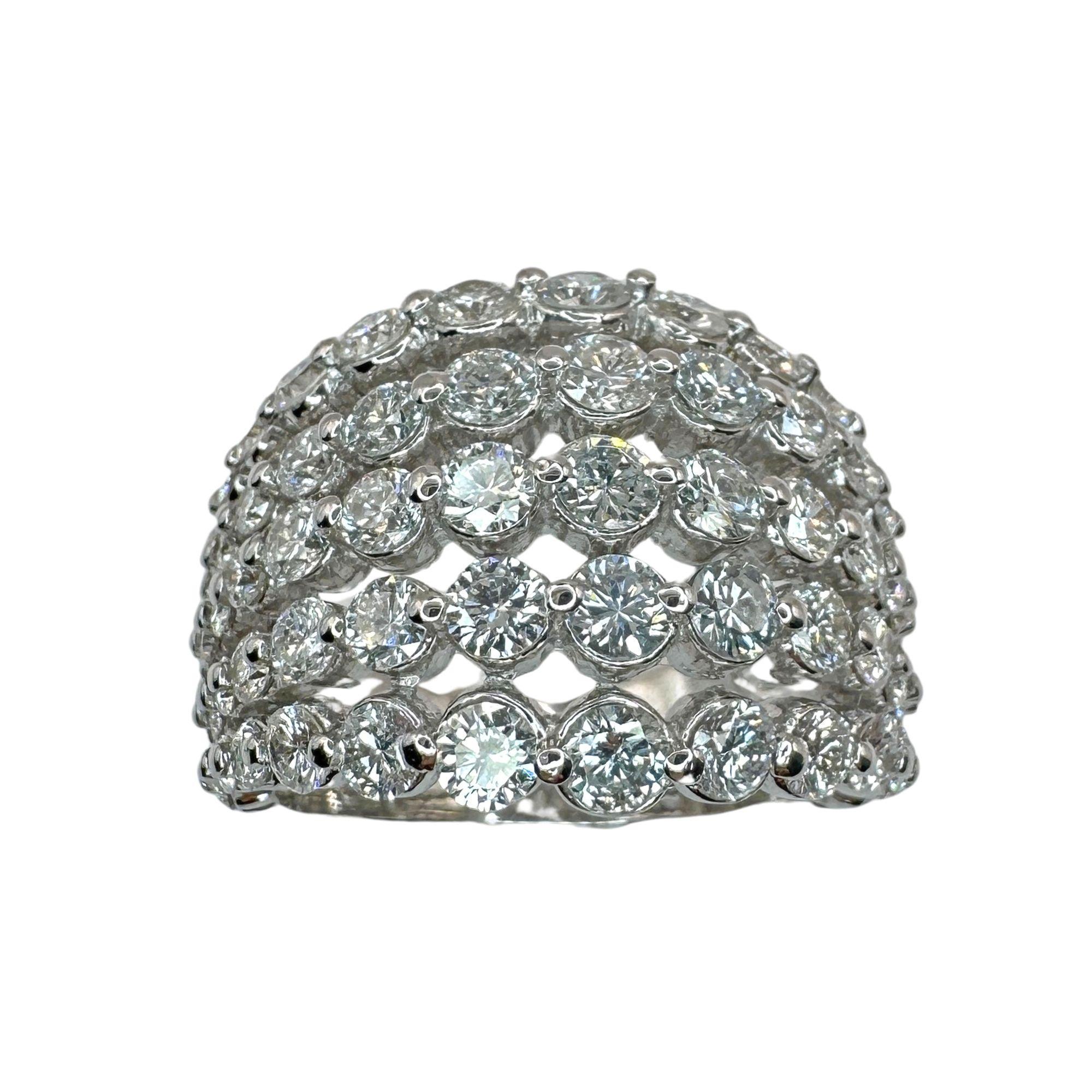 Indulge in luxury with our 18k Diamond Wide Band Ring. Crafted from 18k white gold and adorned with 2.57 carats of sparkling diamonds, this ring exudes elegance and sophistication. In excellent condition with a weight of 9.71 grams, it is marked