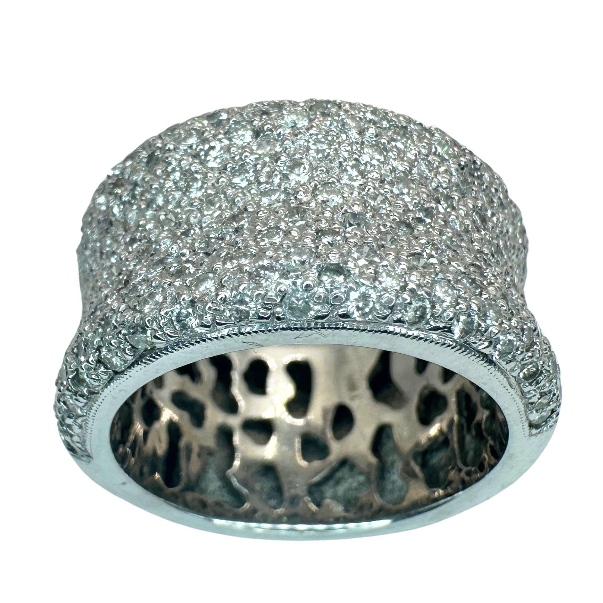 This elegant 18k diamond wide band ring is crafted from 18k white gold and features a total of 2.22 carats of sparkling diamonds. With a ring size of 9 and a width of 13.18mm, this ring is in excellent condition with only minor surface wear. The