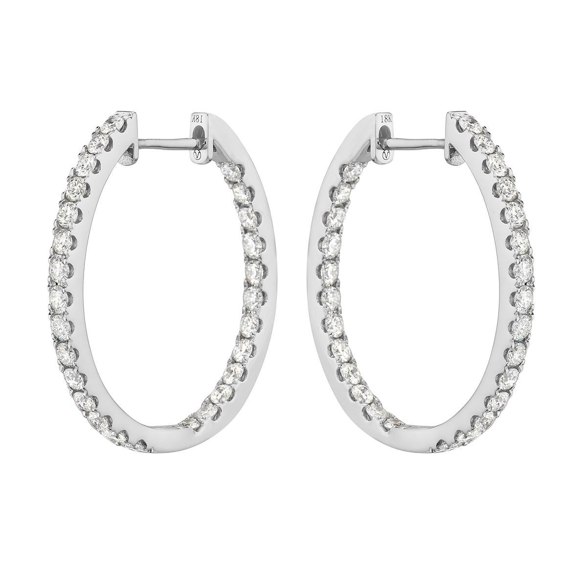 With these exquisite white gold inside and out hoop earrings, style and glamour are in the spotlight. These 18-carat earrings are made from 5.4 grams of gold. These earrings are adorned with VS2, G color diamonds, made out of 54 diamonds totaling