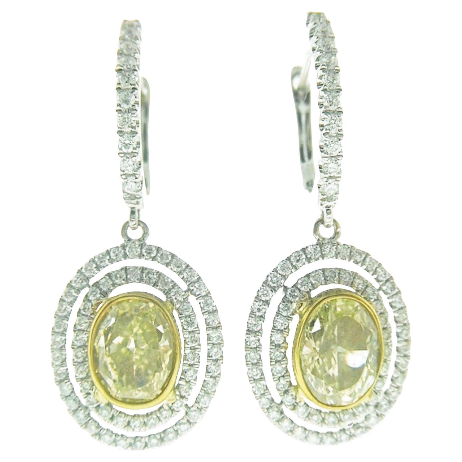 Pendientes colgantes con doble halo de diamantes ovales amarillos fantasía