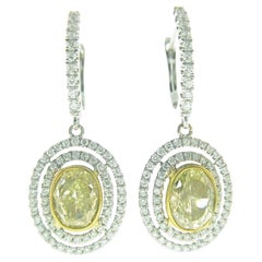 Pendientes colgantes con doble halo de diamantes ovales amarillos fantasía