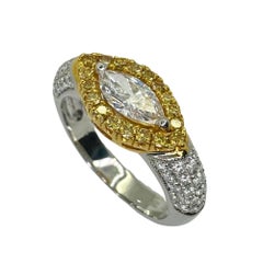 18k East-West Marquise Shaped Diamond Center and Yellow Diamond Halo Ring