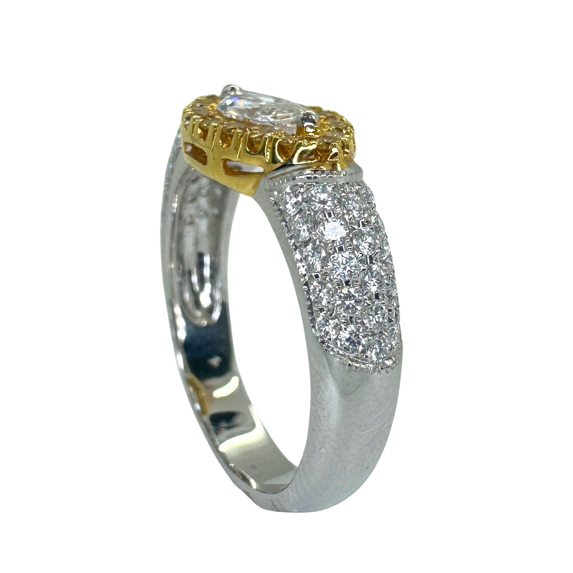 18k East-West Marquise Shaped Diamond Center and Yellow Diamond Halo Ring In Good Condition For Sale In New York, NY