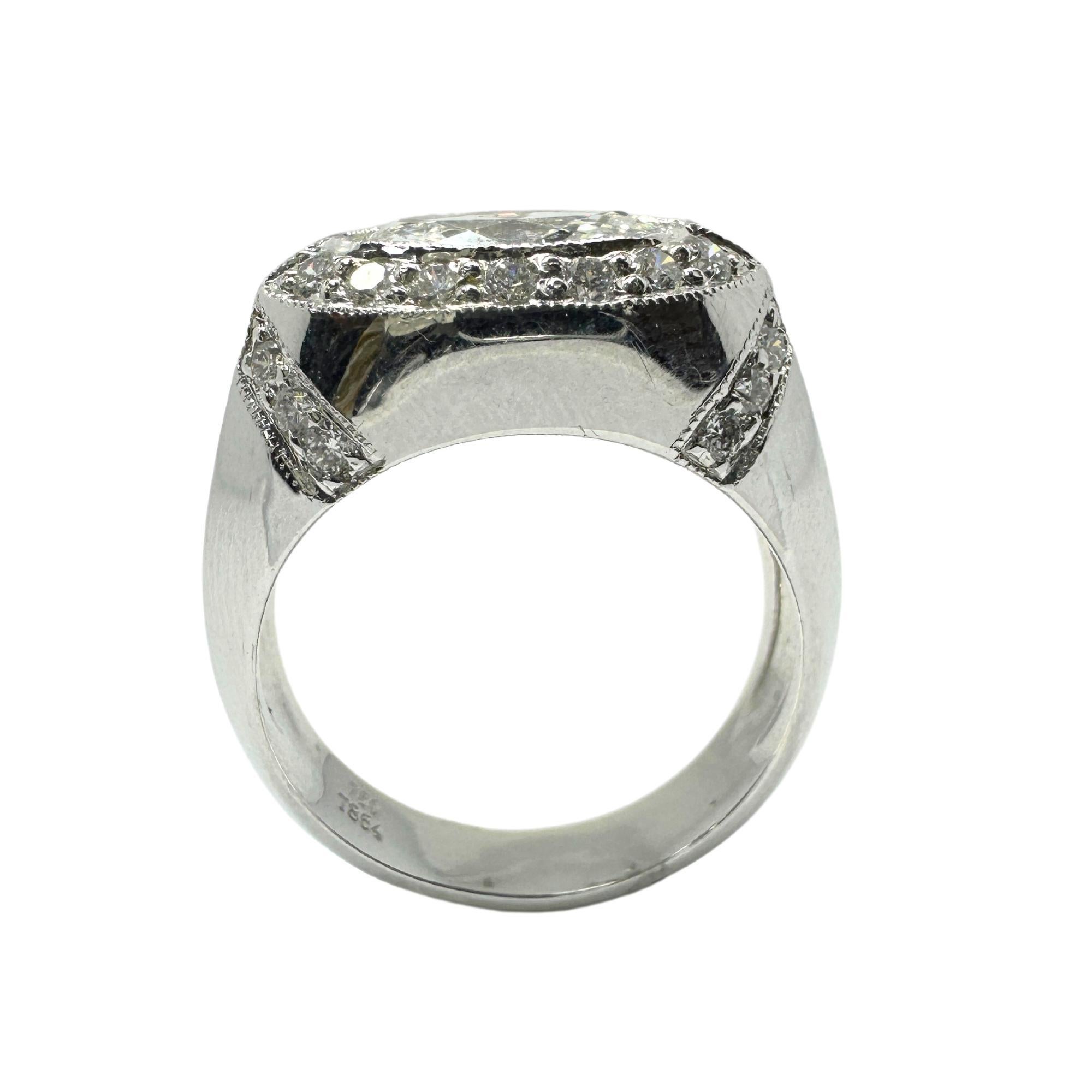 18k East-West Marquise Shaped Diamond Center Ring with Diamond Halo Ring In Good Condition For Sale In New York, NY