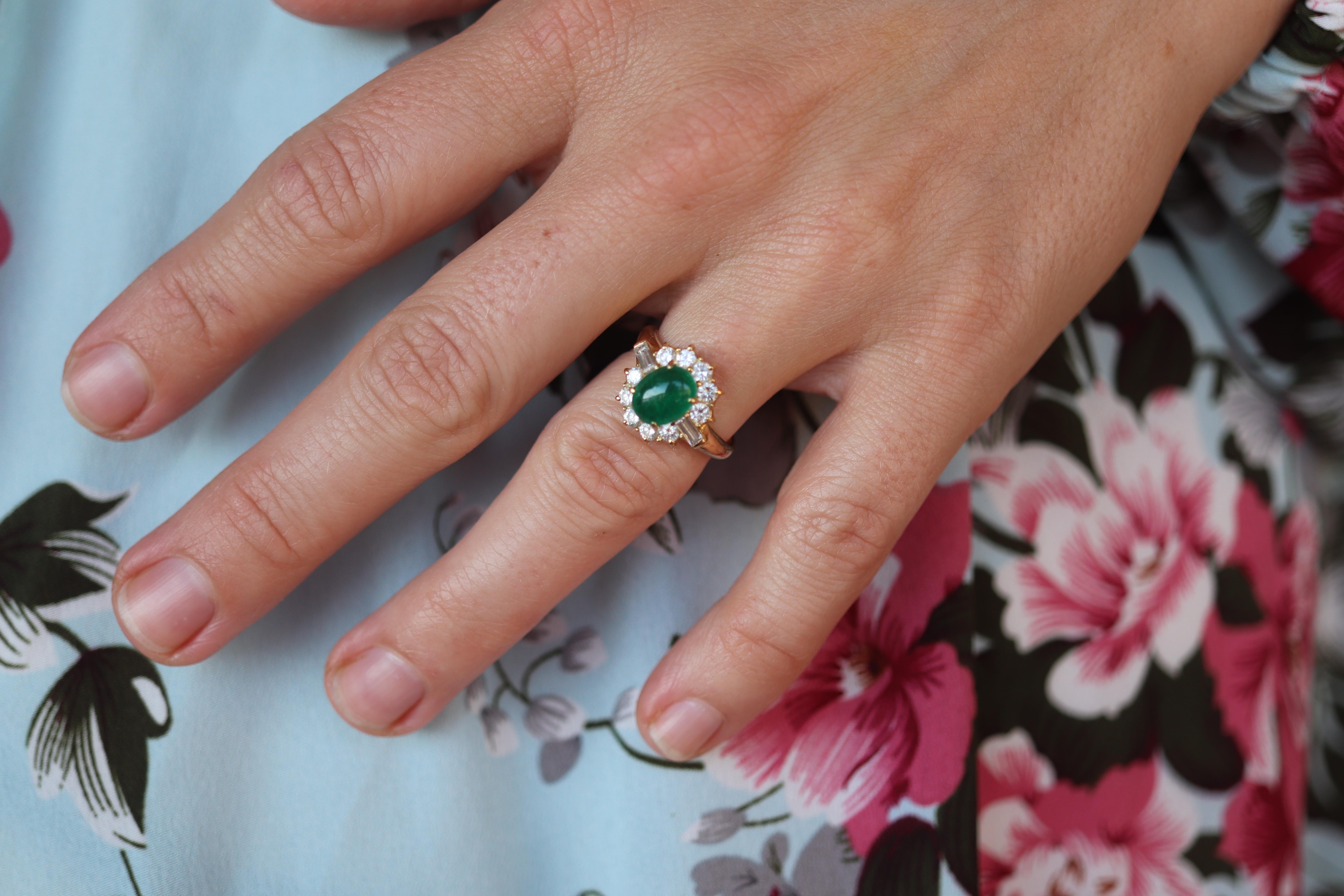 Very Beautiful Halo ring. High quality made.

18k Yellow Gold.

1.53ctw Natural Cabochon Emerald.

Appraised at $6960. Appraisal is included.

Stunning bright green cabochon emerald, set with halo of  beautiful 0.84ctw of diamonds. You cannot go