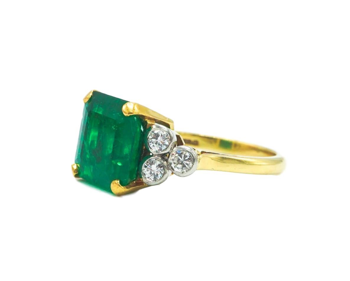 Contemporary 18 Karat Emerald and Diamond Ring with AGL Report For Sale