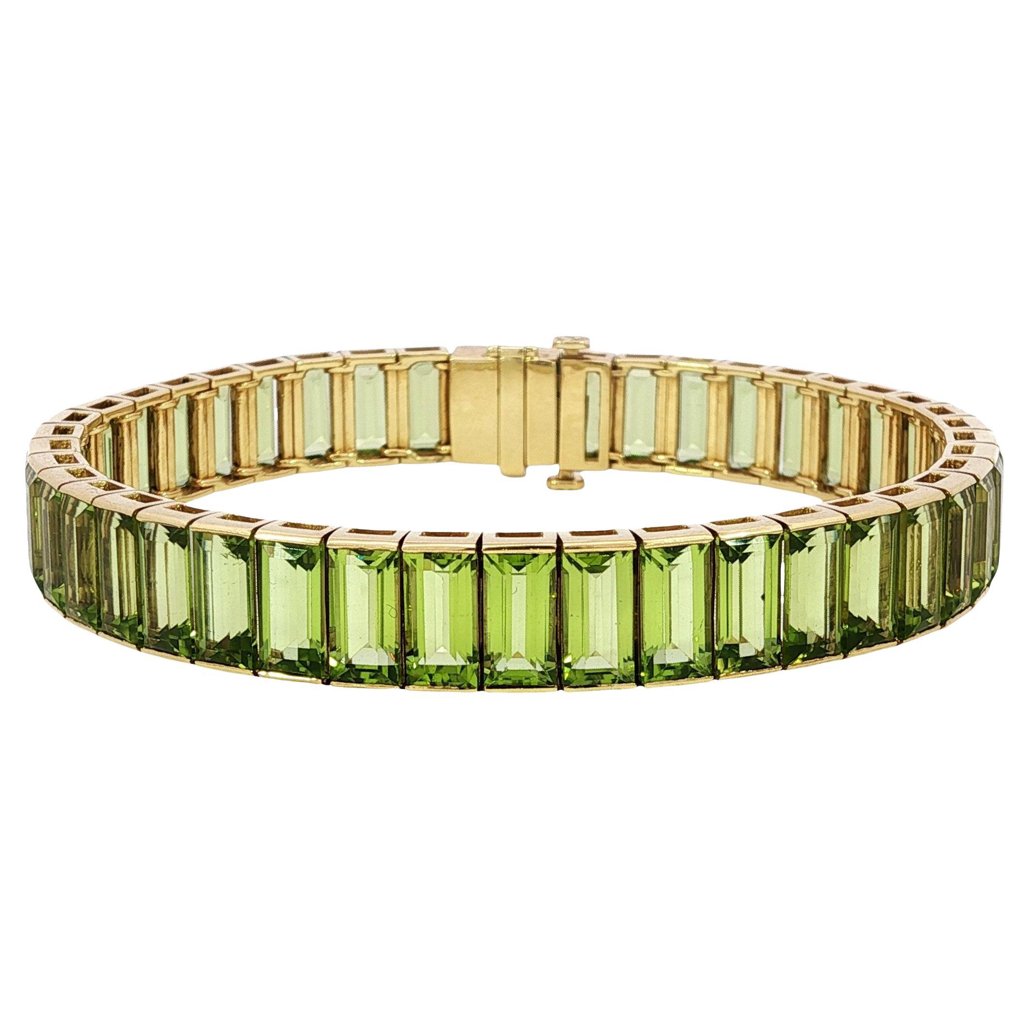 18K Emerald Cut Bracelet Peridot Straight Line Tennis Bracelet 18K Gold ~26ctw For Sale