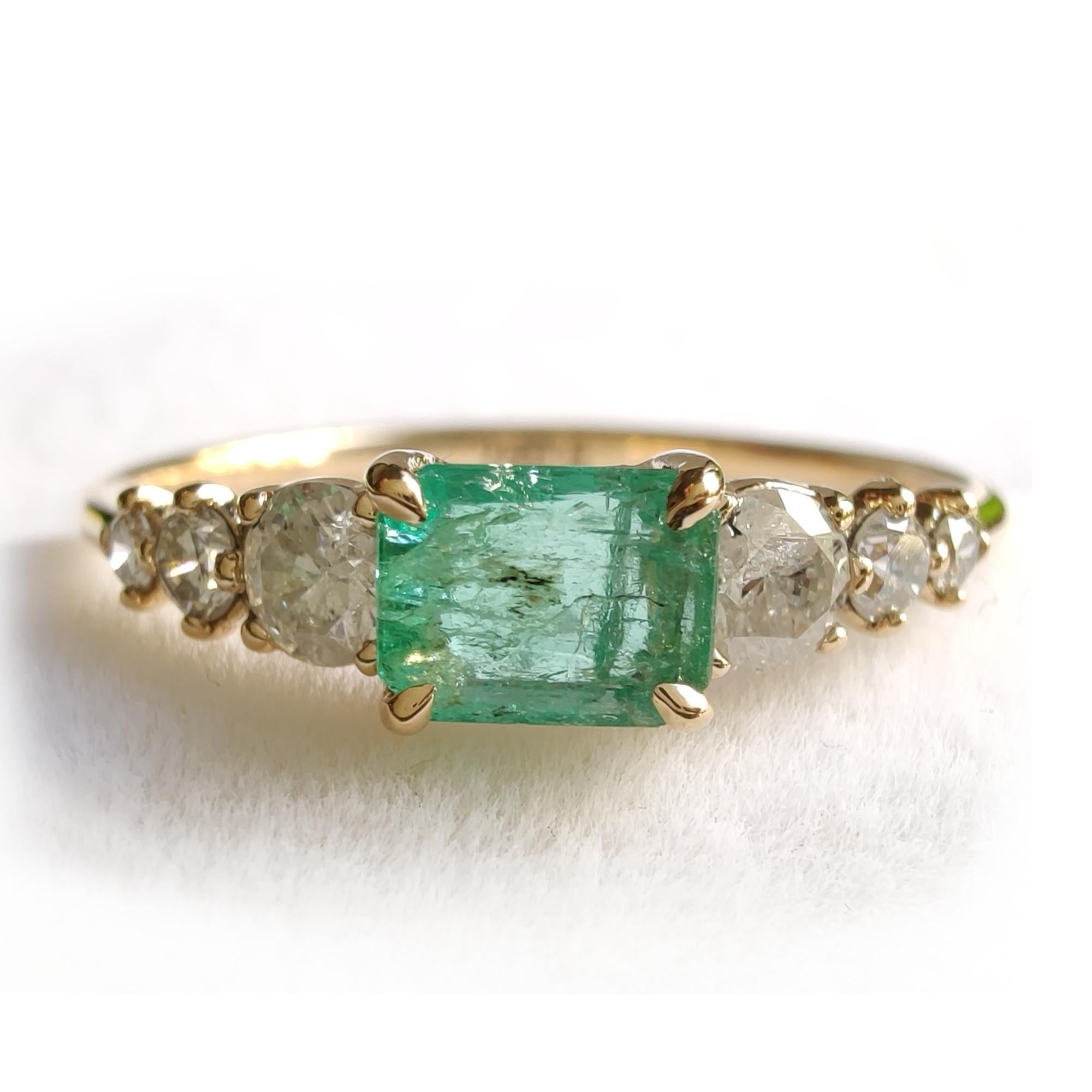 18k emerald and diamond ring, perfect for women seeking a unique engagement piece or a special Christmas gift. This elegant ring features an emerald and brilliant diamonds, ideal as a gift for a girlfriend or loved one

SIZE: Resizable

American