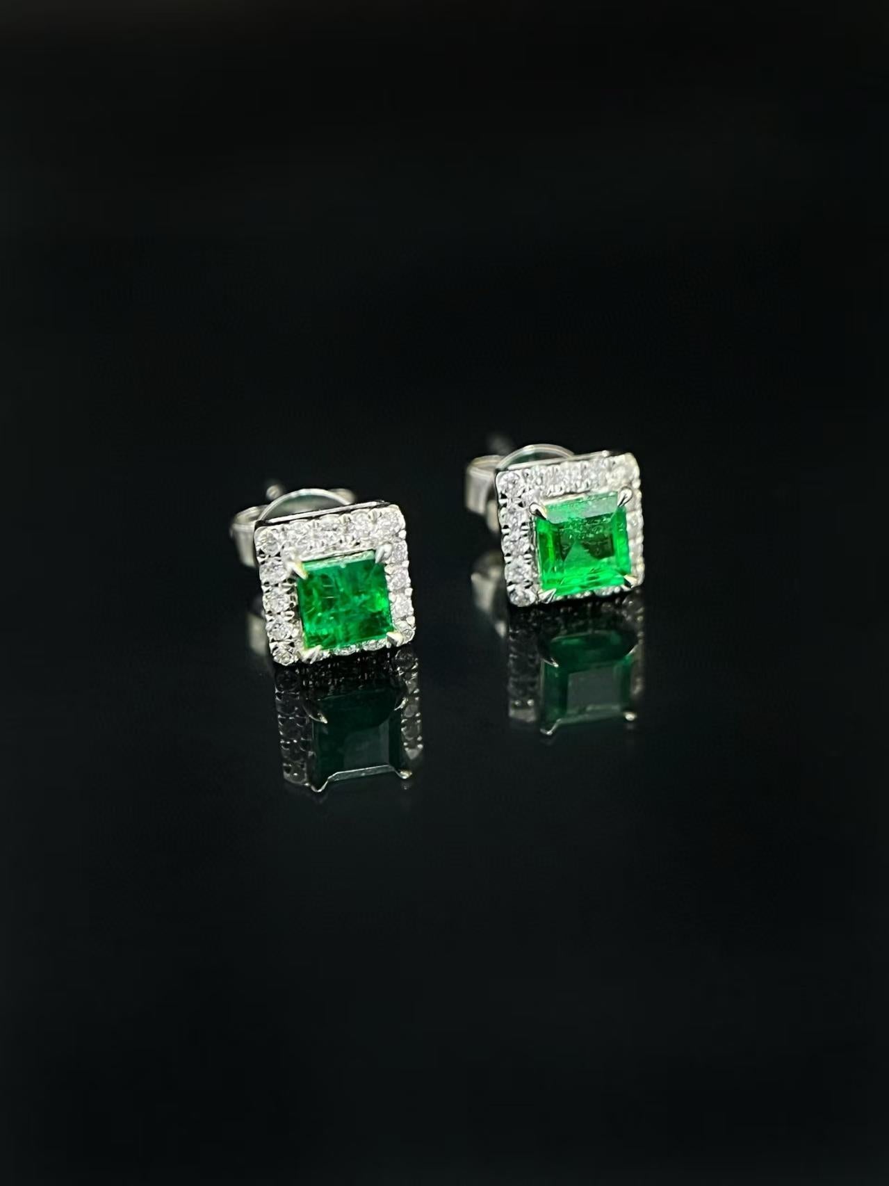 18K Emerald Stud Earrings with Halo of Diamonds

Main Stone Emerald - 0.42 CT
Side Stone Diamonds - 0.12 CT
Total Weight - 1.26 GM

Elegant Design: These earrings feature a classic square -shaped design. The central emerald is the focal point,