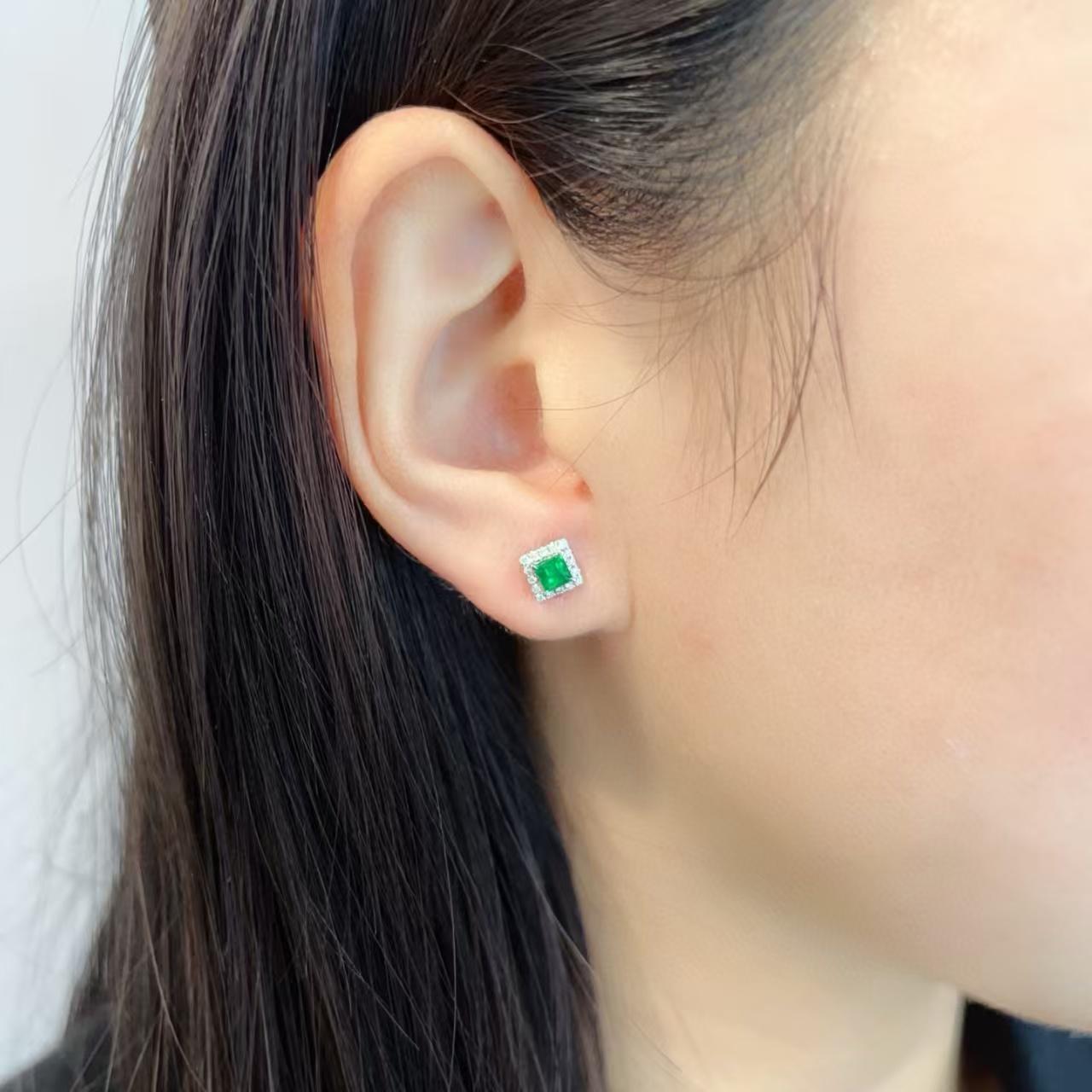Emerald Cut 18K Emerald Stud Earrings with Halo of Diamonds For Sale