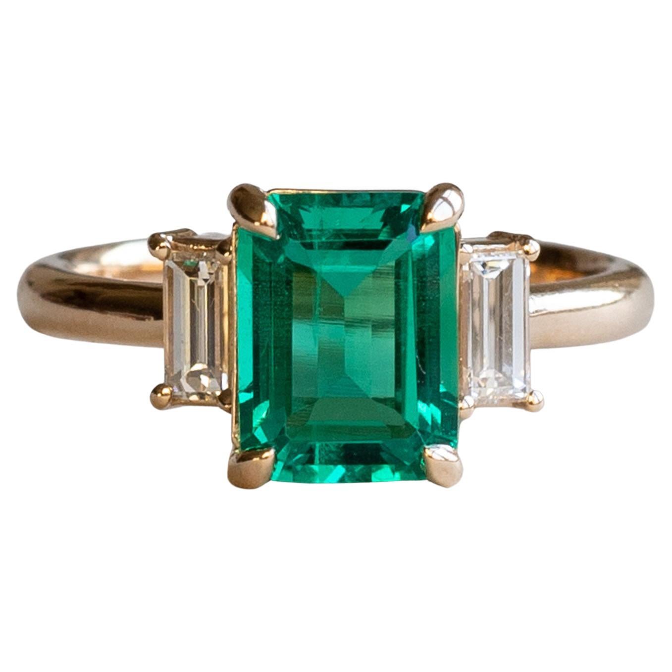 18k 1.4 Carat Lab Emerald with Baguette Diamonds Ring, Three Stone Ring For Sale