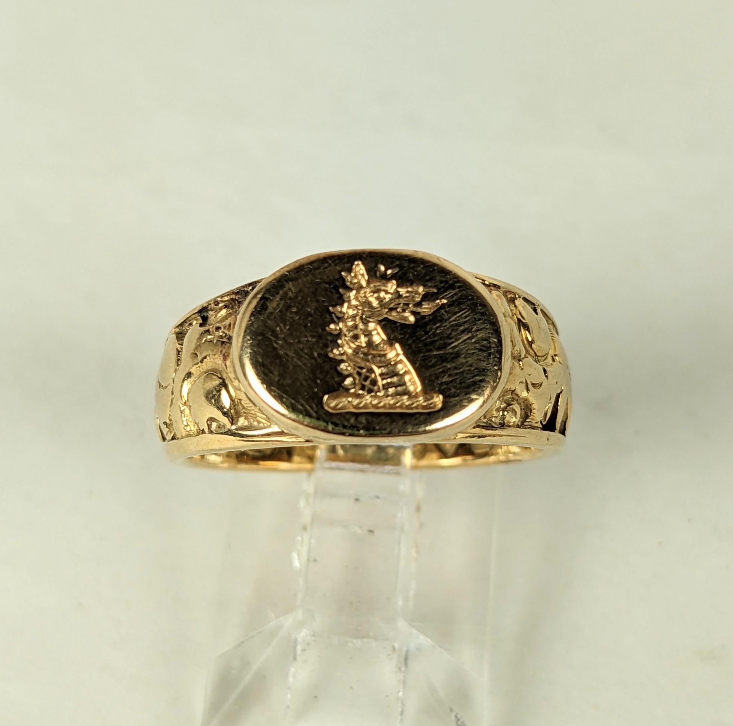Elegant 18K English Dragon Signet Ring from the 1940's. Tapered band is decorated with repousse patterns with a central dragons head. Beautiful quality. UK. SIgned J.L., Date stamps for 1971 London.
Size 6 suitable for anyone. 