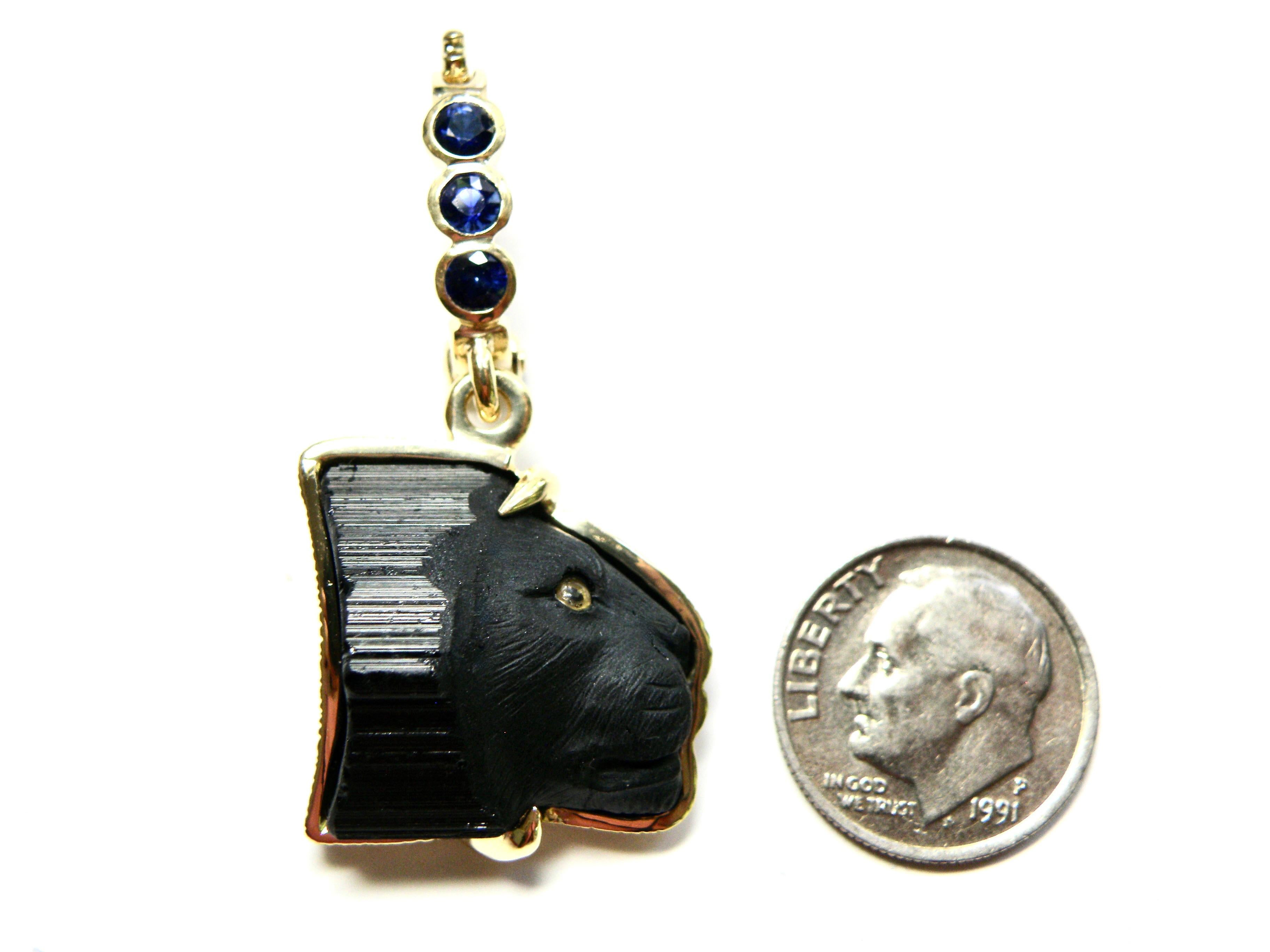 Contemporary 18k Enhancer, carved black tourmaline lions head, blue sapphire bail For Sale