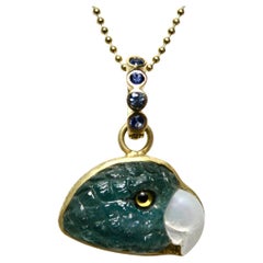 18k Enhancer, carved Teal Tourmaline Parrot Head, sapphire bail