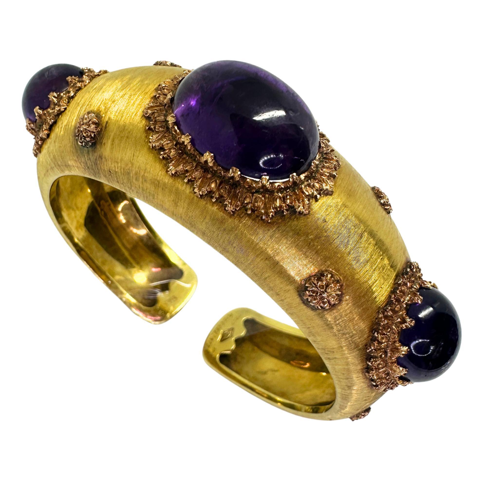 18k Estate Buccellati Bold Oval Cabochon Amethyst Spring Cuff
Condition: In good condition with some minor surface wear consistent with age.
Period: Estate
Measurements: 7/8