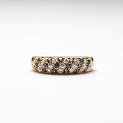 Bague en or 18 carats avec diamants et saphirs d'occasion