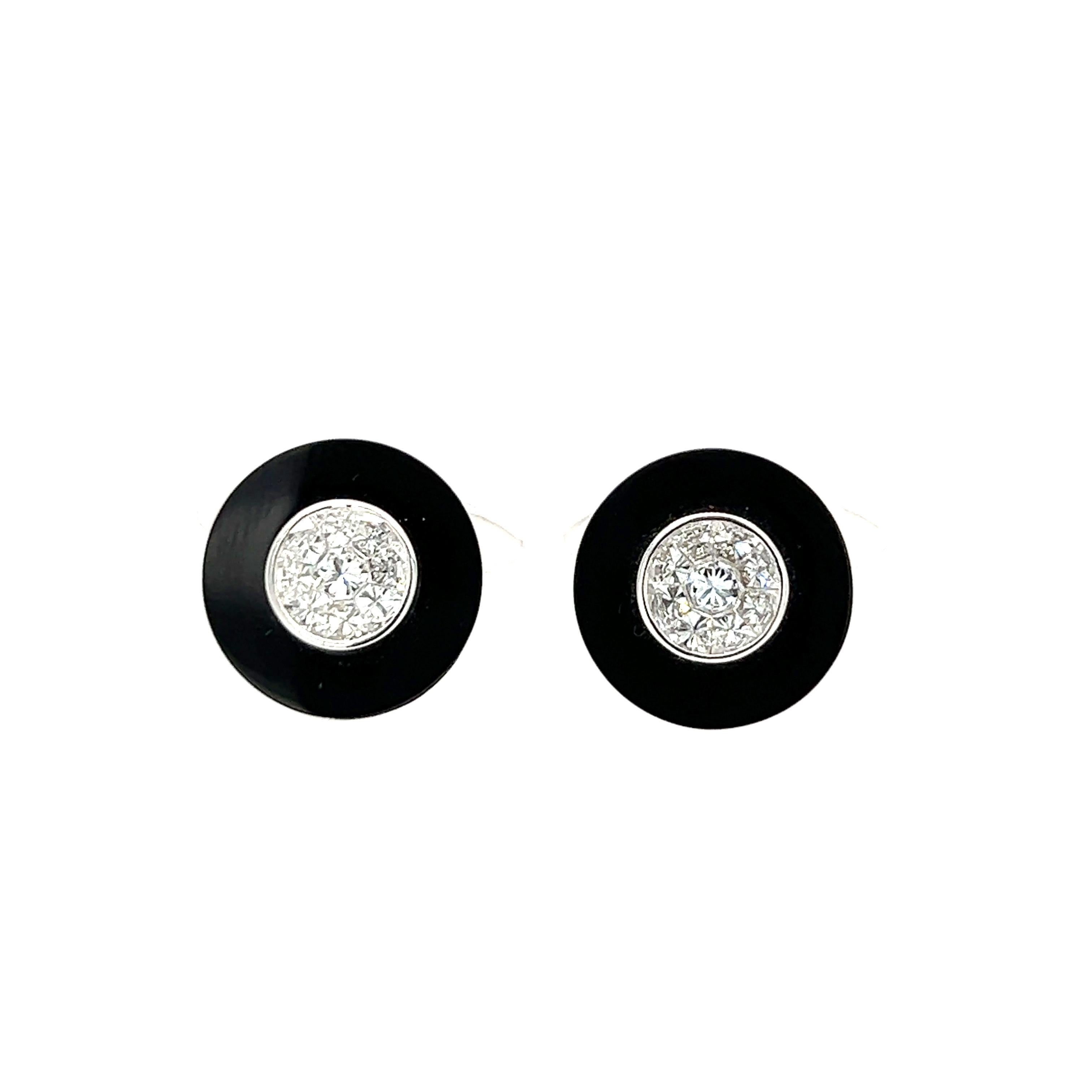 18K Exquisite Diamonds with Onyx Cufflinks . Only One Pair. 

18 Diamonds - 0.96 CT
2 ONYX - 8.23 CT
18KW 8.42 GM 

ONYX is super powerful stone. stone of all stones! Onyx offers up powerful vibrations of protection, strength, focus, and willpower.