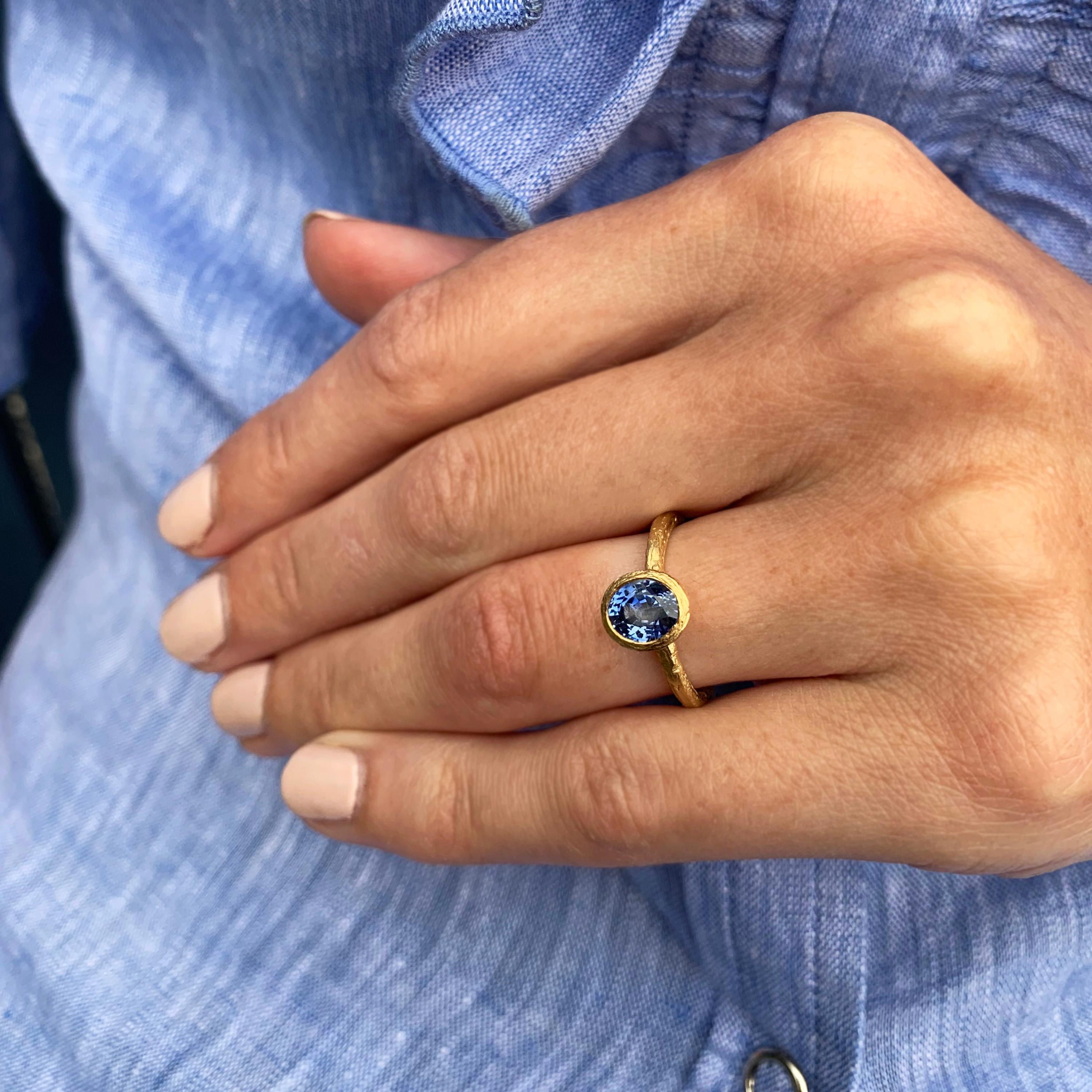 The most beautiful vibrant blue sapphire created in Diana’s signature style. A raised bezel setting cups the sapphire beautifully with an organic etched finish throughout the ring itself.
Ring Size: K1/2. Band Width: 1.9mm. Band Profile: round.