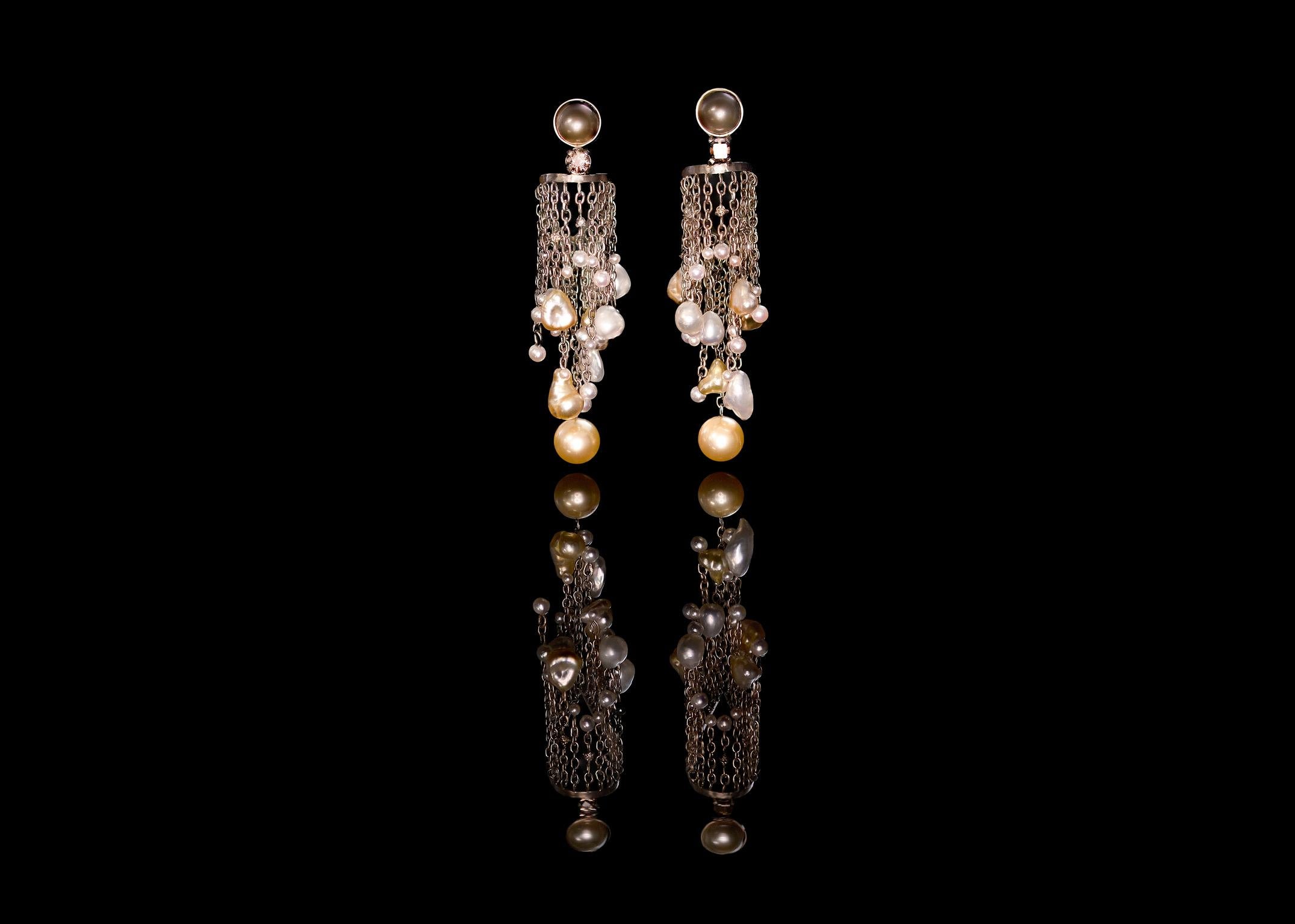 One-of-a-kind Medusa earrings, made of 18K Fairmined white gold, Ocean Diamonds from South Africa, sustainable pearls from the South Sea and traceable Akoya pearls from Vietnam. Every part, including each link of each chain has been completely