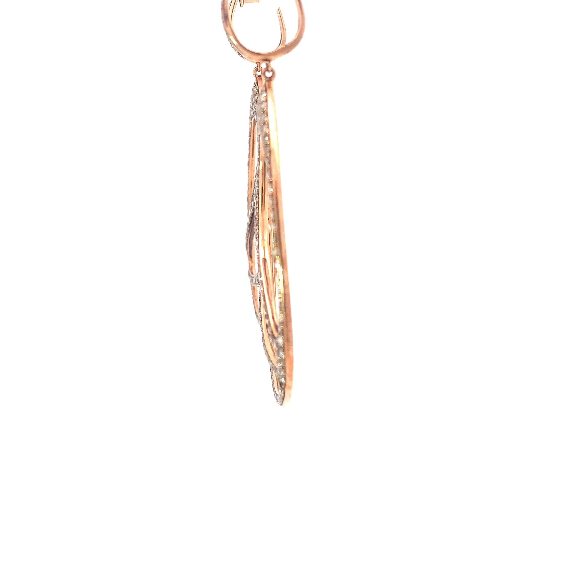These yellow gold earrings, set with petite melee brown diamonds, exude a refined warmth and understated elegance.

Brown diamonds, often referred to as “champagne” or “cognac” diamonds, derive their color from naturally occurring internal